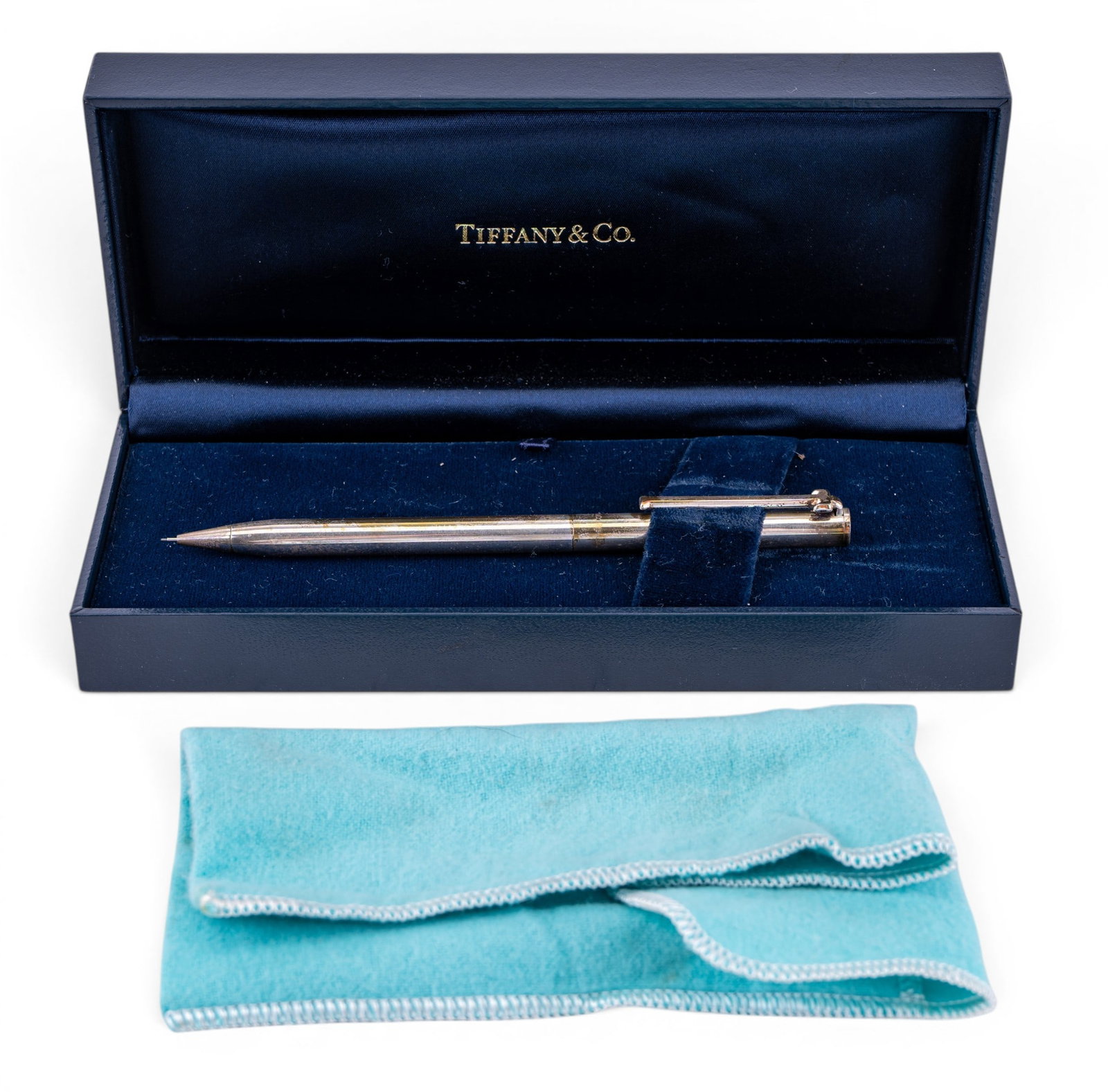 Tiffany & Co Sterling Mechanical Pencil: A Tiffany & Co sterling silver mechanical pencil with original box and silver cloth, cap can be removed to reveal an eraser.