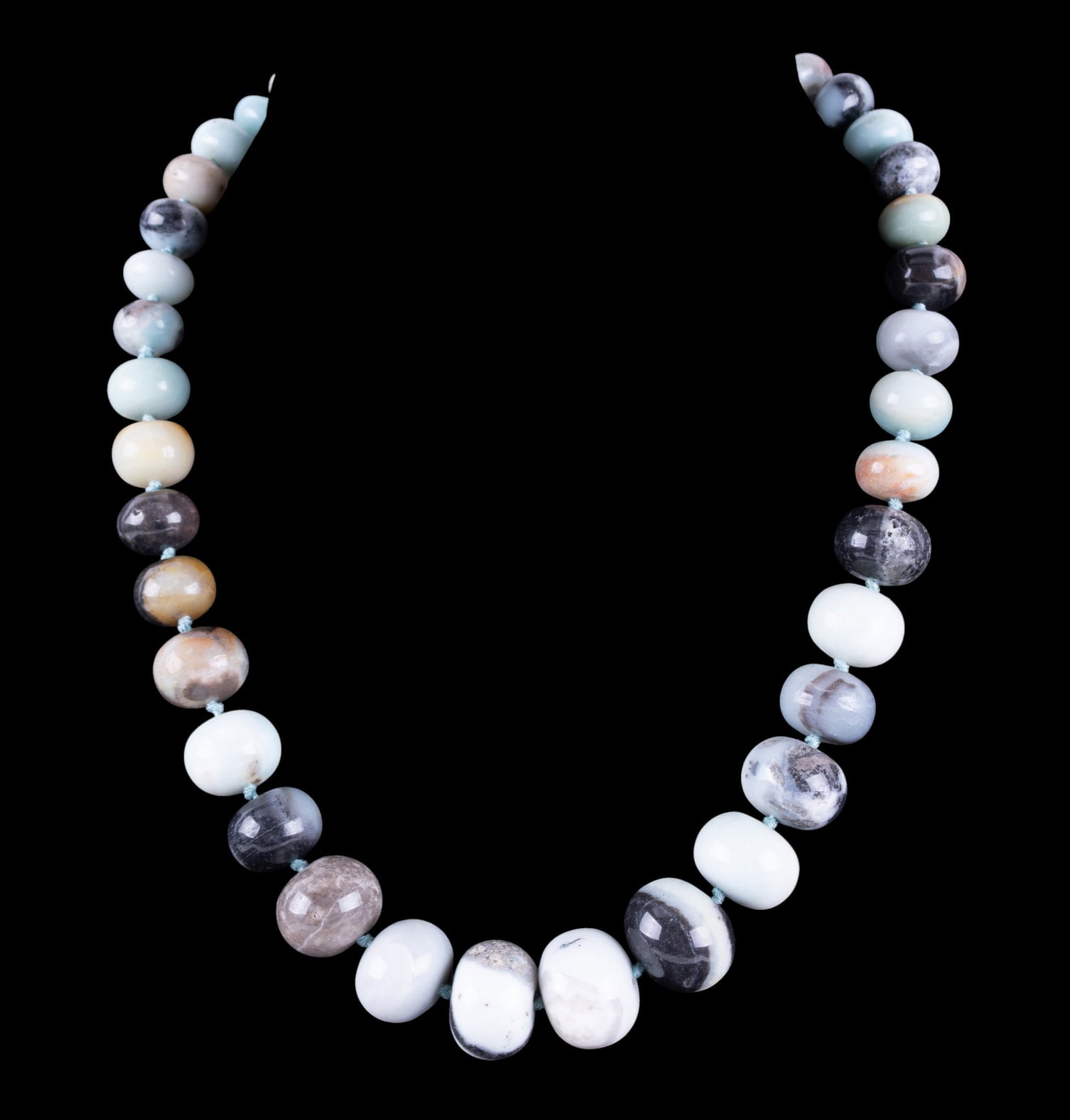 Amazonite Necklace: Polished Amazonite bead necklace with sterling silver closure.