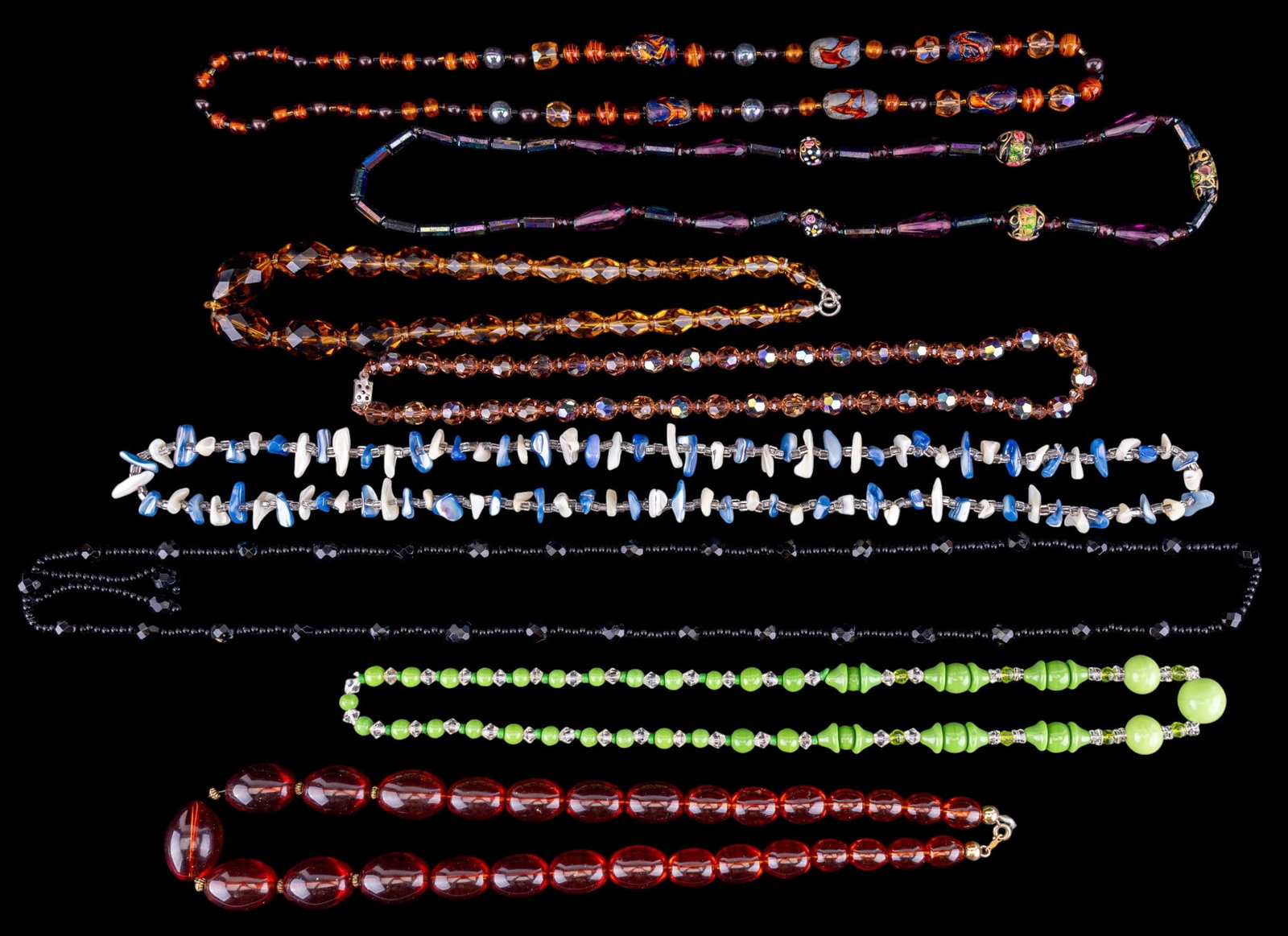 Group of Vintage Necklaces: Eight vintage glass, crystal, and beaded necklaces.