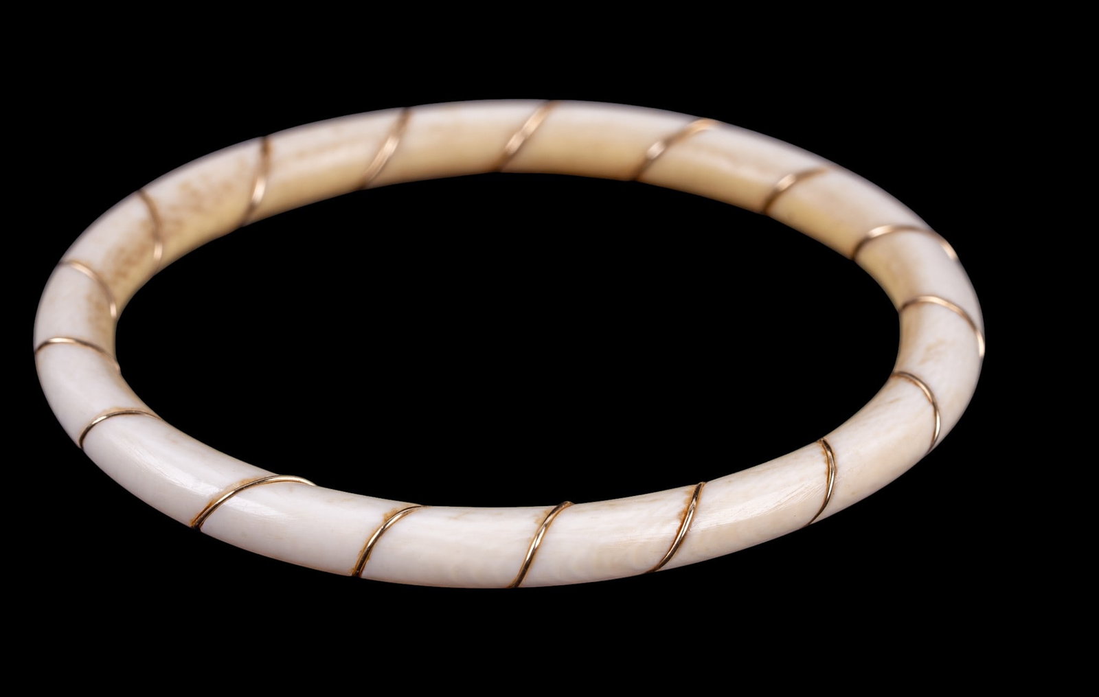 14k Gold and "Bone" Bangle: A vintage bone bangle decorated with fine 14k wire
