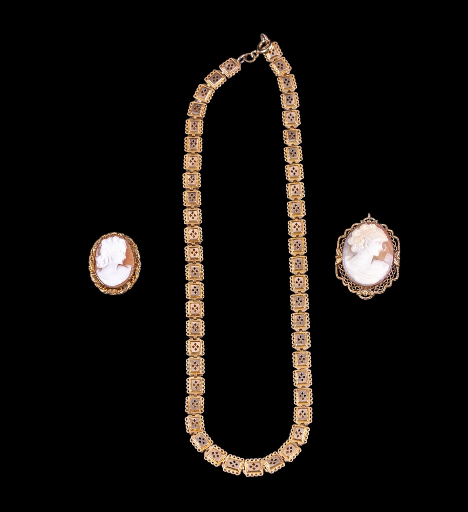 Victorian Gold Filled Necklace and Cameos: A Victorian gold filled book chain necklace, approx. 8" L on the drop, a Van Dell 12K GF cameo brooch/pendant, and a smaller 12K GF cameo brooch/pendant.