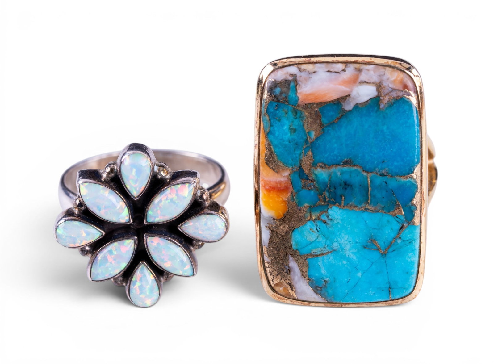 Sterling Silver Cocktail Rings (2): A sterling silver cocktail ring with opal floral center and a gold tone sterling ring with rectangular turquoise center, both size 10, total weight is approx. 0.7oz.