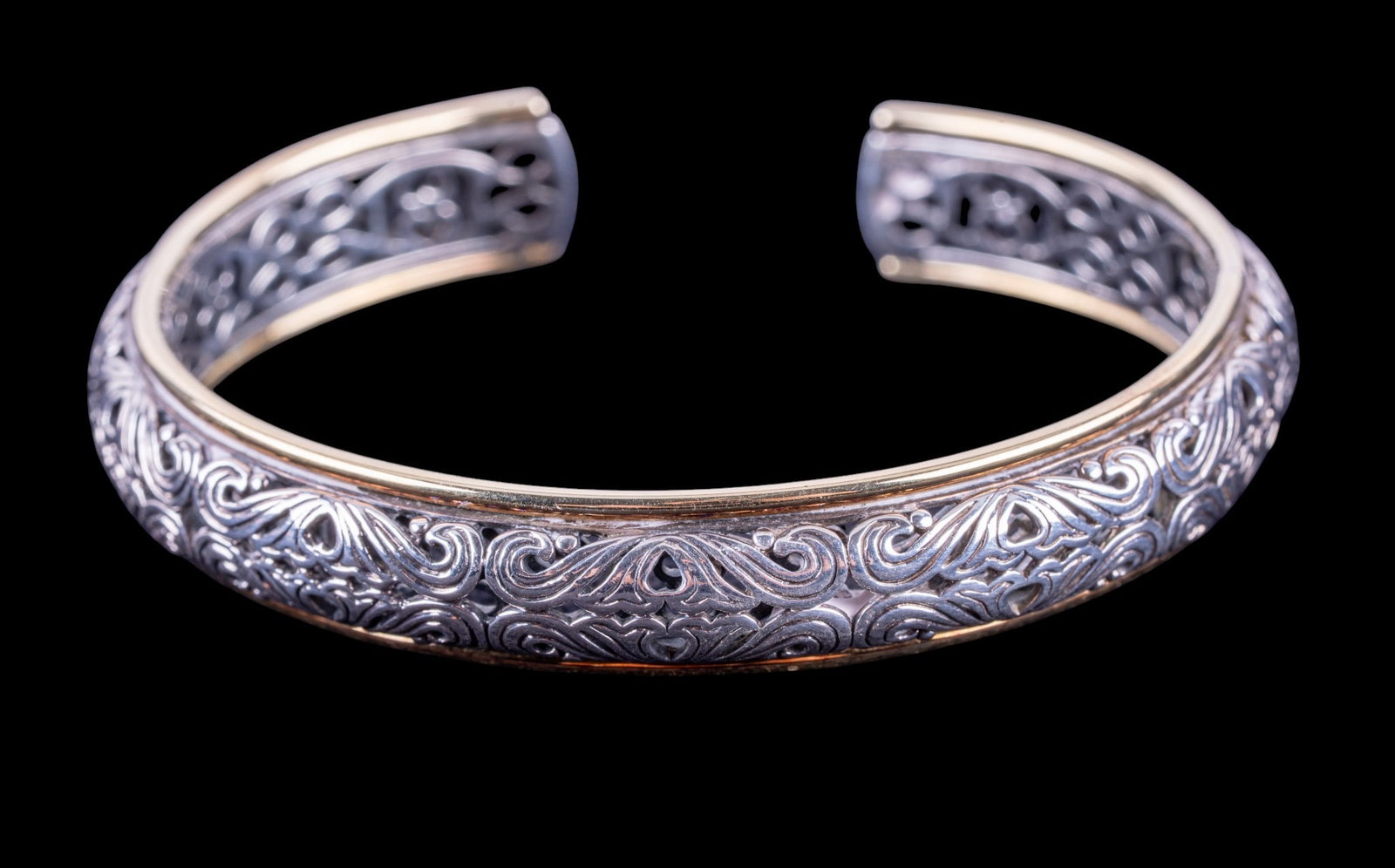 Charles Krypell 18K/14K/925 Cuff Bracelet: A pierced filigree style cuff bracelet with small hinge for easy wear consisting of 18K and 14K gold, and sterling silver, includes original box. Total weight is approx. 0.8oz.