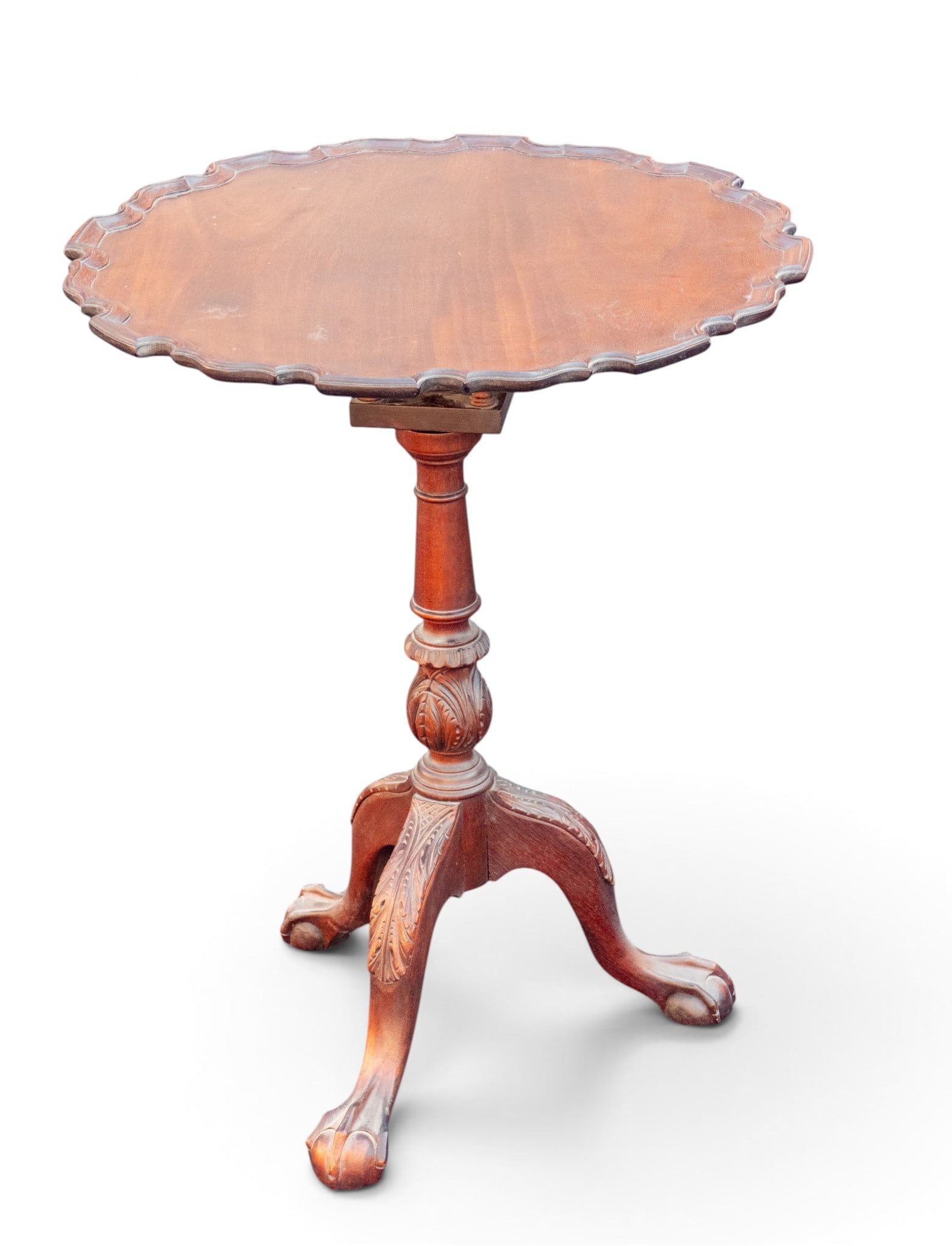 Antique Pie Crust Tilt-Top Table: Antique mahogany birdcage tilt-top occasional table with scalloped pie crust top mounted on birdcage. Measures approx. 30" H x 24" Diameter.