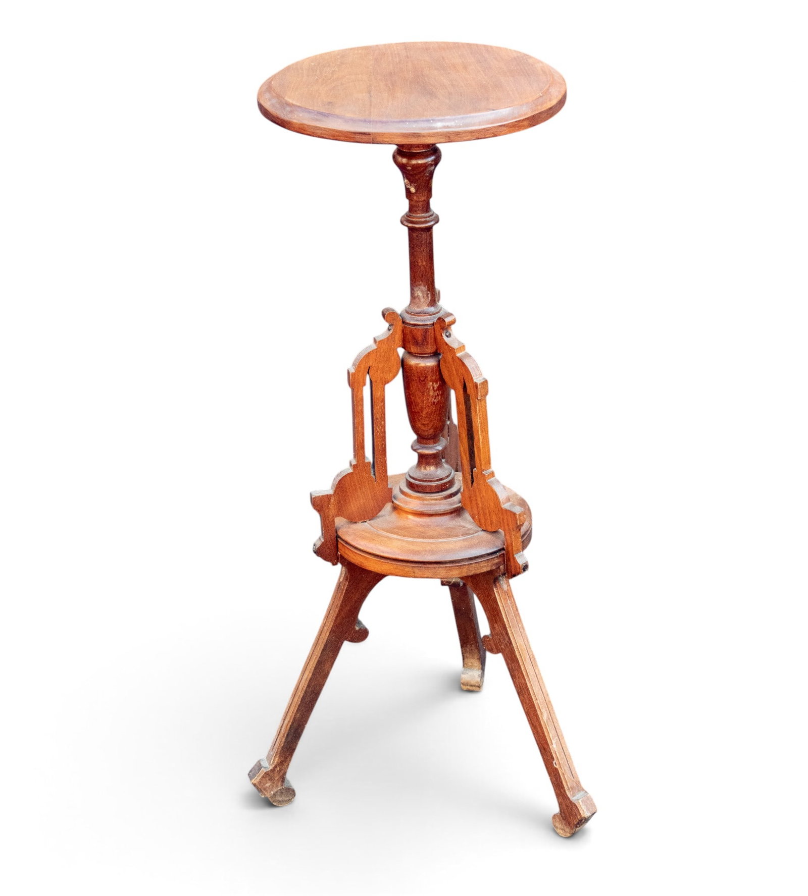 Unusual Victorian Walnut Candle Stand: Victorian walnut candle stand with pierced base elements on 4 legs. Measures approx. 30" H x 11.5" Diameter x 13" W.