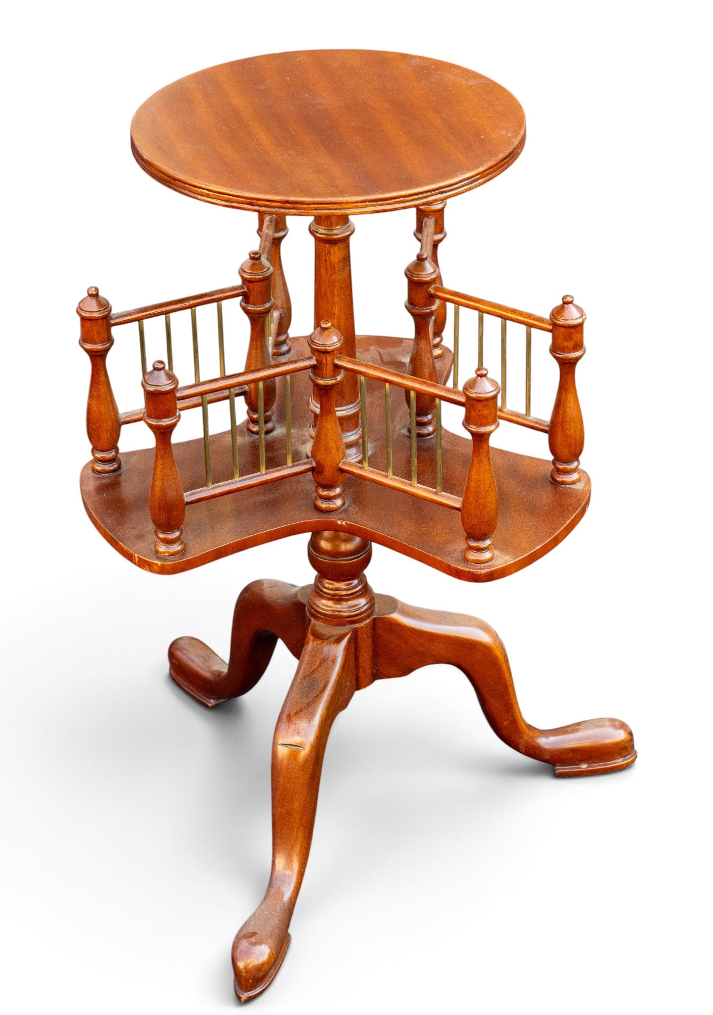 Antique-Style Revolving Wooden Book Table: Antique-style revolving wooden book table featuring circular top and spindled revolving lower shelves on a tripod base. Measures approx. 28.5" H x 17" Diameter at widest part.