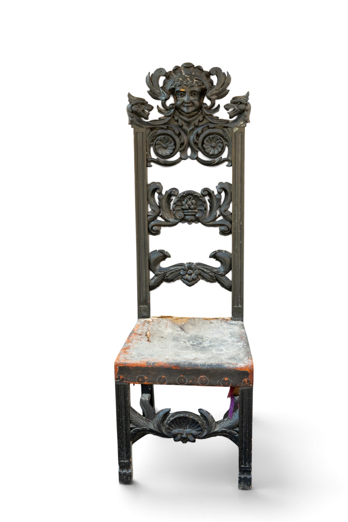 18/19 Heavily Carved European High-Back Chair: Late 18/Early 19th century heavily carved European Renaissance high-back chair with shell-carved apron and H-stretcher base. Leather seat in need of re upholstery. Measures approx. 17.5" SH x 15.25"
