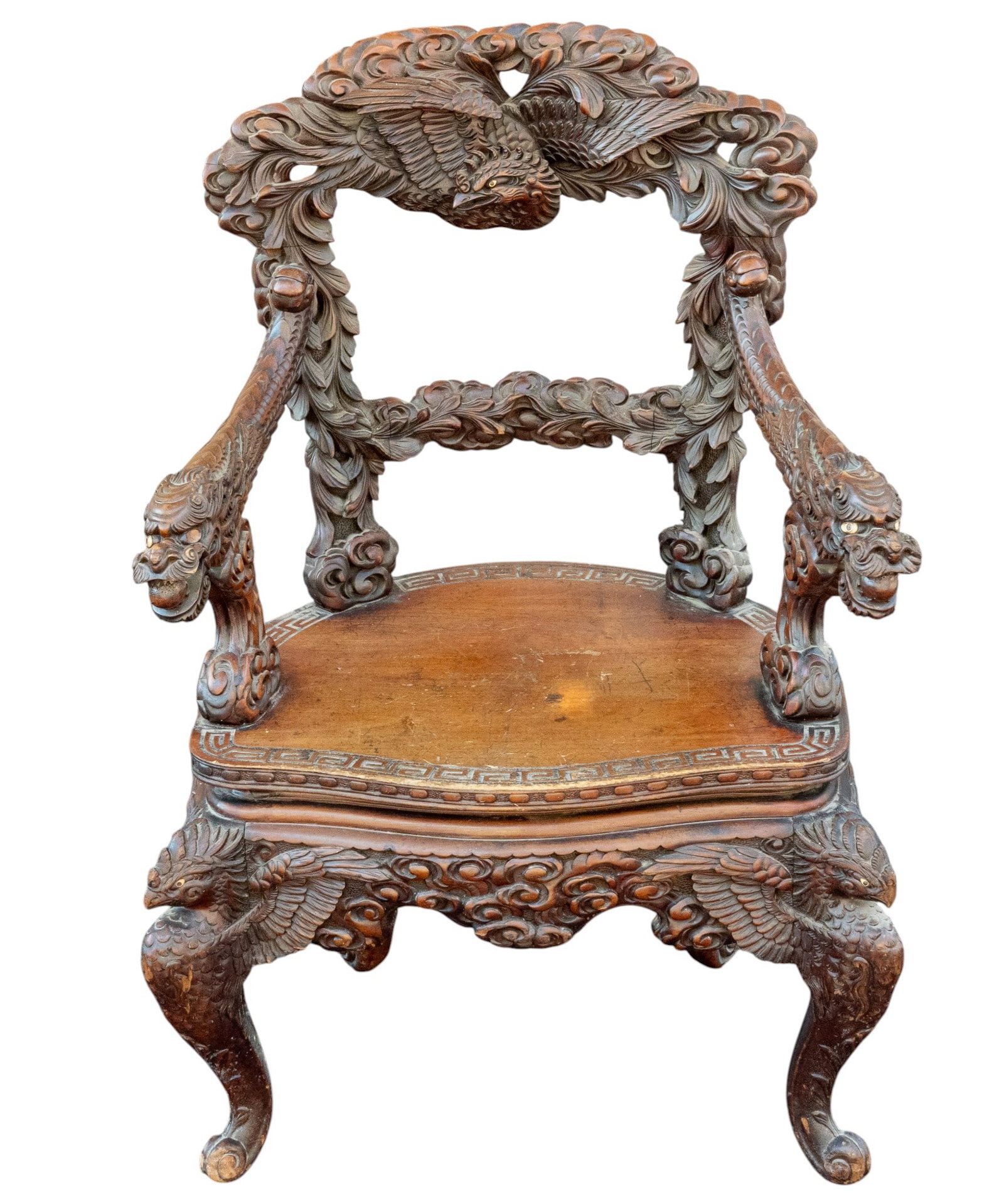 Highly Carved Chinese Dragon/Phoenix Chair: Chinese armchair heavily carved with a phoenix crest rail, dragon-form arms, and phoenix cabriole legs. Measures approx. 38" H x 17.5" SH x 26" W x 20" D. Note arms slightly loose.