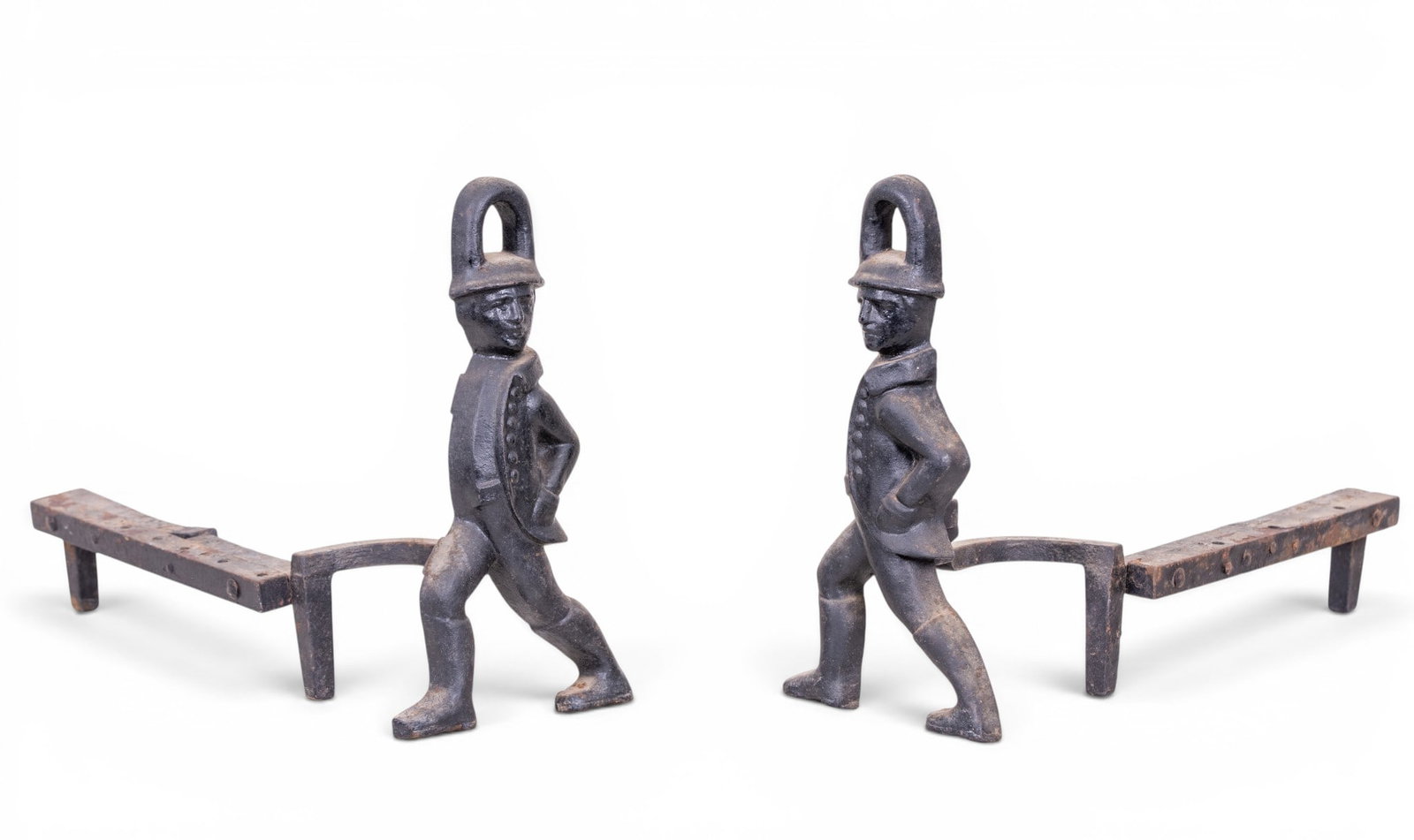 Early Figural Hessian Soldier Andirons: A pair of early figural Hessian soldier andirons with riveted brackets, both measure approx.12" H x 6" W x 17.5" D.