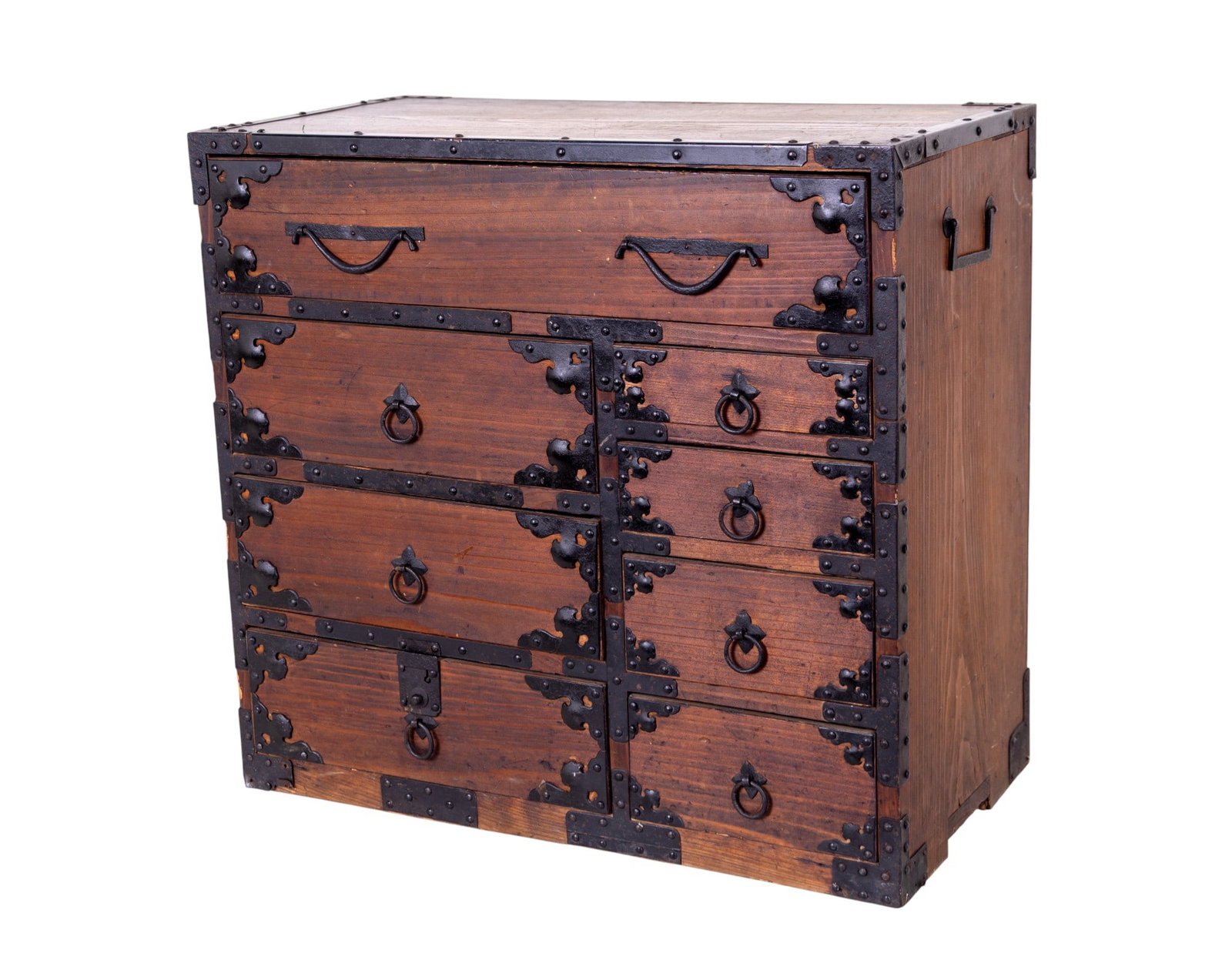 Japanese Silver Chest w/ Iron Mounts: Small Japanese silver chest, constructed of stained wood with ornate iron corner brackets, side pulls, drawer pulls, and lock plates. Chest features a mix of wide and narrow drawers for storage. Some