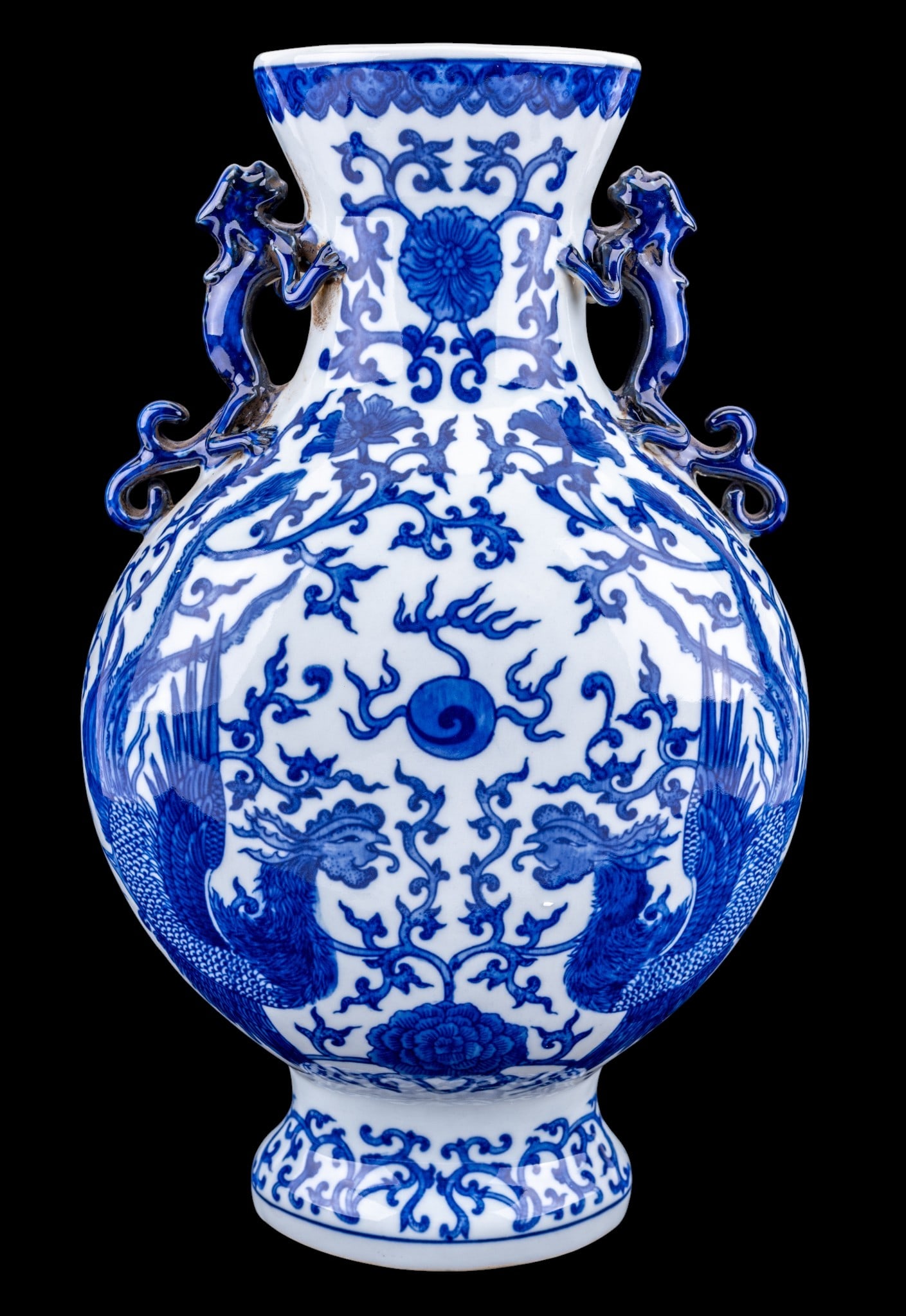 Chinese Blue and White Porcelain Moon Flask: Chinese 20th century blue and white porcelain moon flask with molded animal form handles and decorative foot. Bears cobalt blue square seal mark to underside. Measures approx. 14" H x 8.25" W.