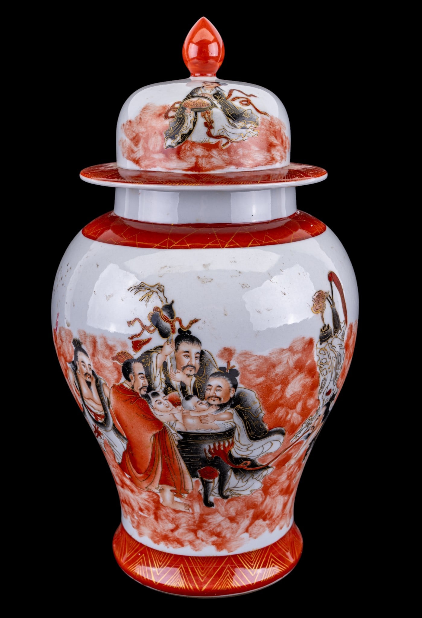 Chinese Covered Ginger Jar: Chinese 20th century porcelain covered ginger jar decorated with figures amid iron red clouds with black calligraphic inscriptions to the reverse. Underside bears a 6-character mark in iron-red. Measu