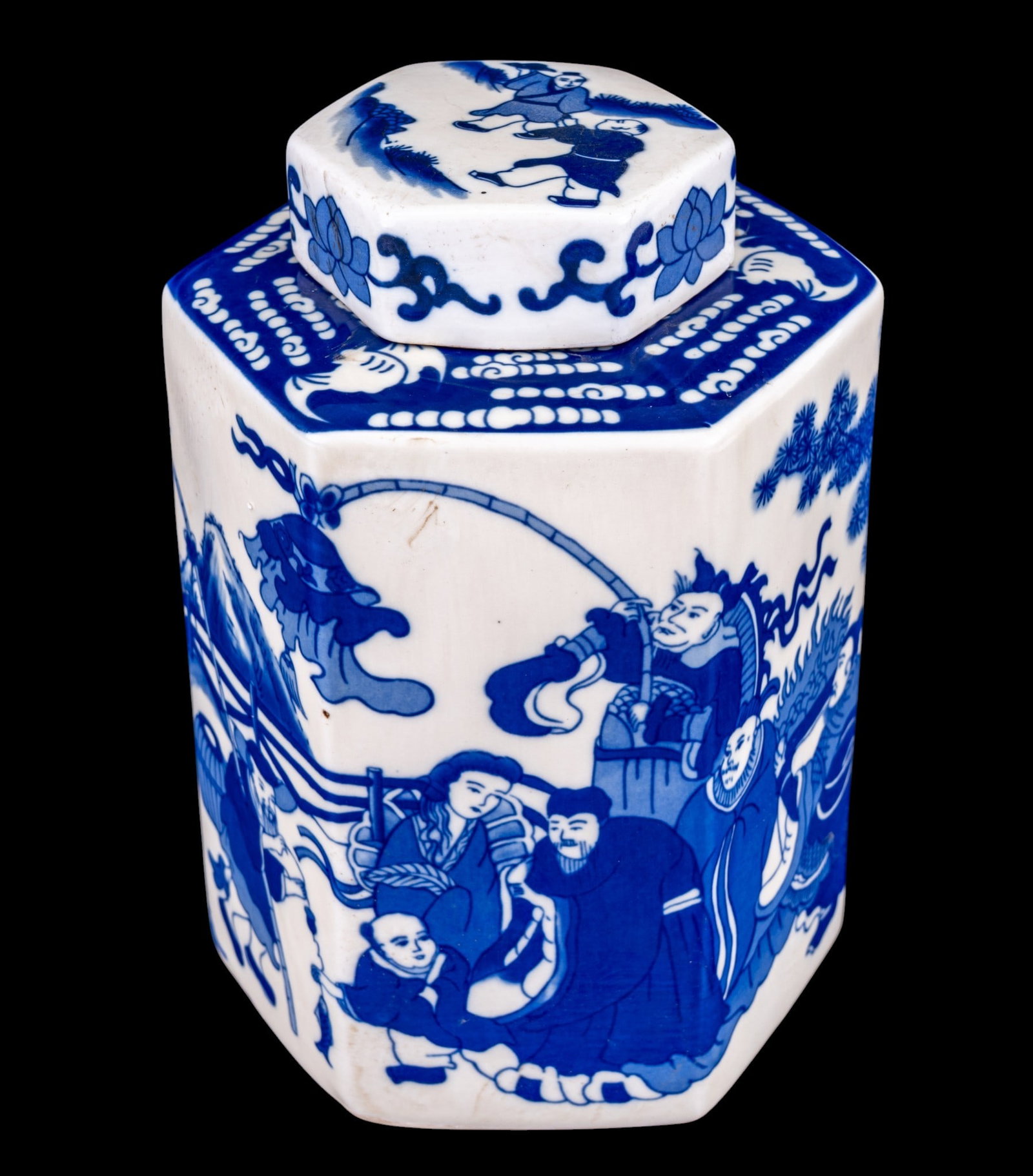 Chinese Blue and White Covered Tea Caddy: Chinese 20th century blue and white porcelain hexagonal covered tea caddy, decorated with alternating figural and landscape panels. Underside bears a 6-character mark in cobalt blue. Measures approx. 