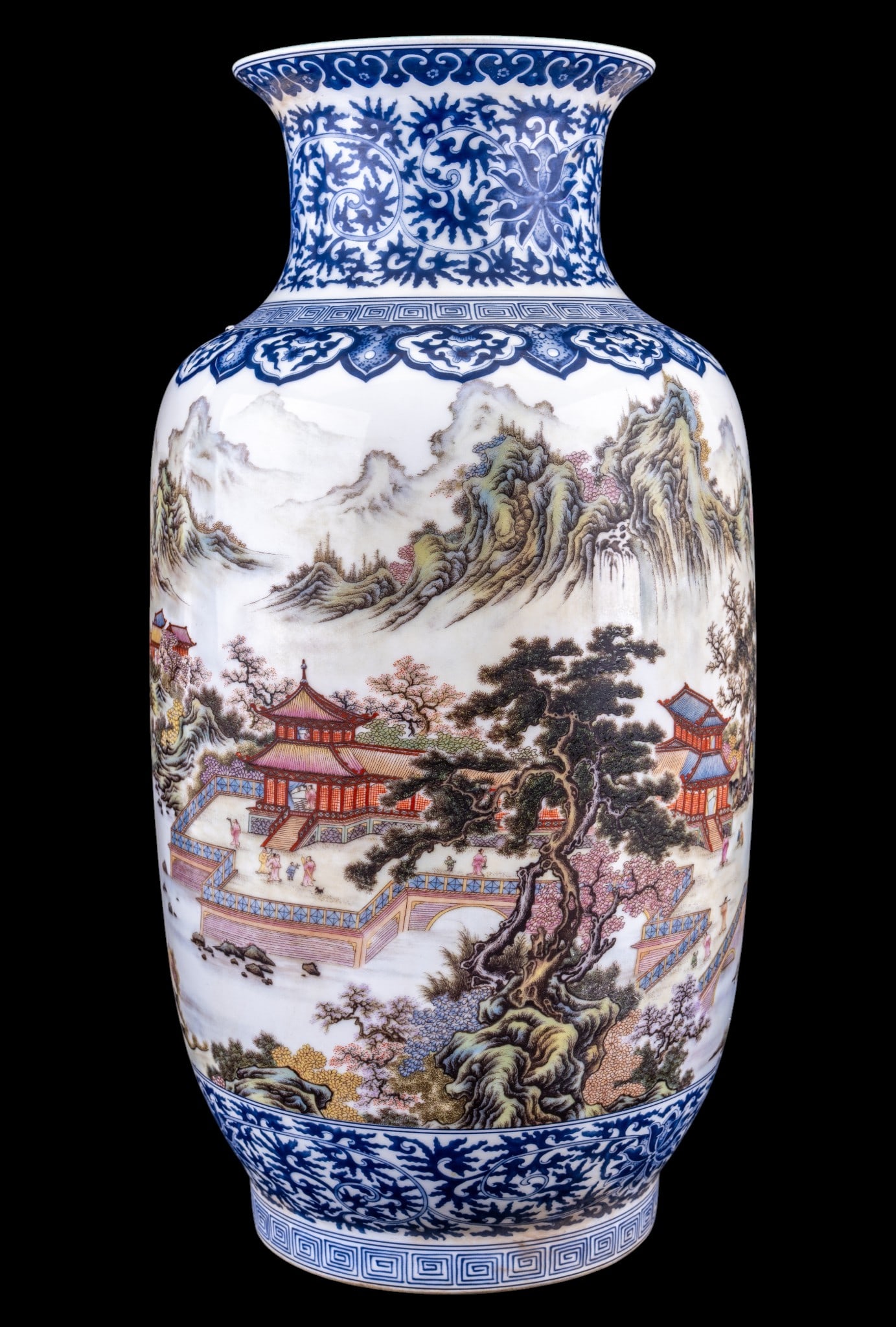 Chinese Blue and White Porcelain Vase: 20th century Chinese blue and white porcelain vase of baluster form featuring a flared trumpet neck with body decorated in a lanscape scene with calligraphy to reverse. Interior and underside in