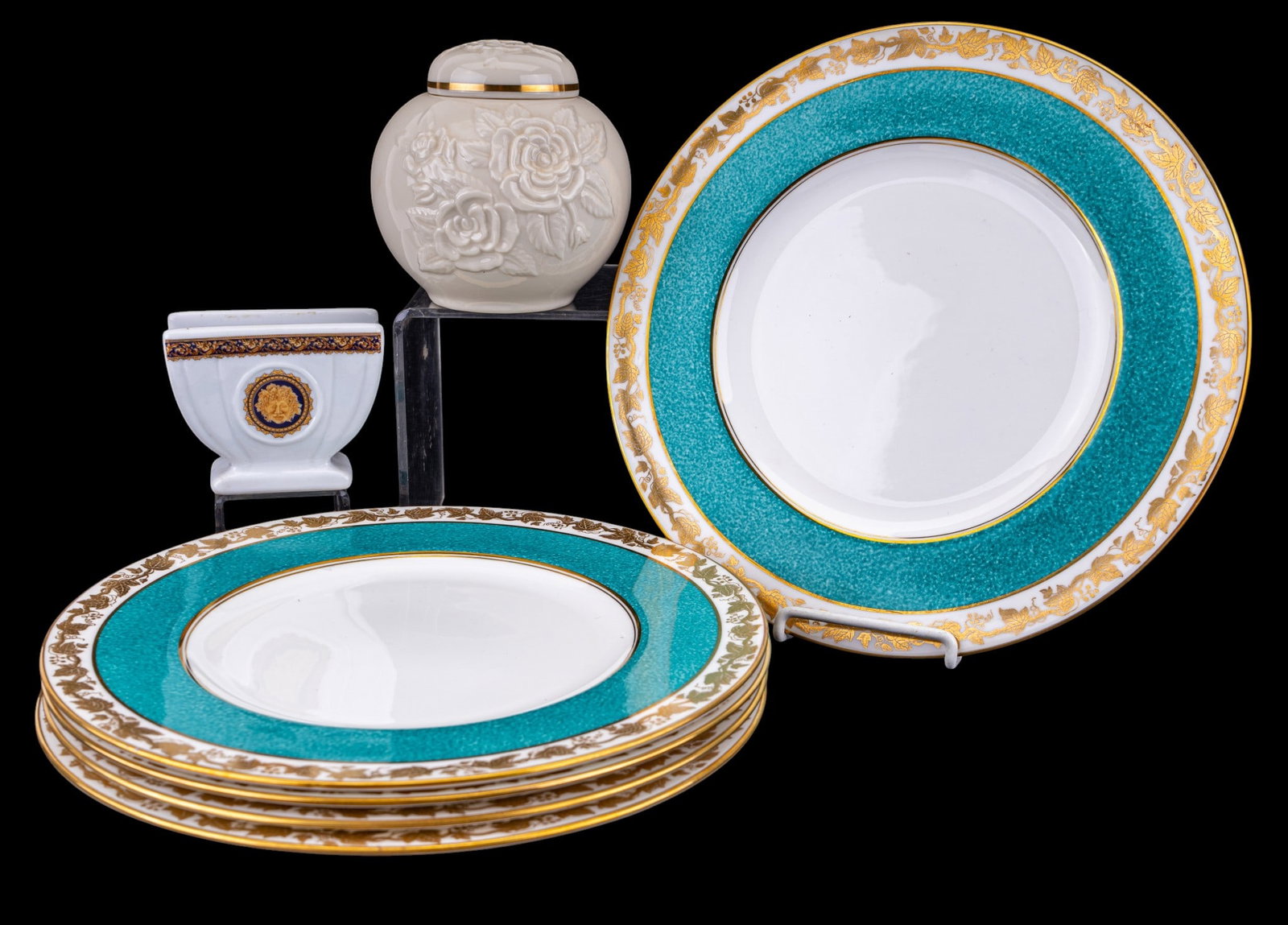 Wedgwood Plates and Limoges Containers: Wedgwood includes five 10.5 inch diner plates in the Whitehall pattern. The Limoges includes a napkin rack and small lidded jar.