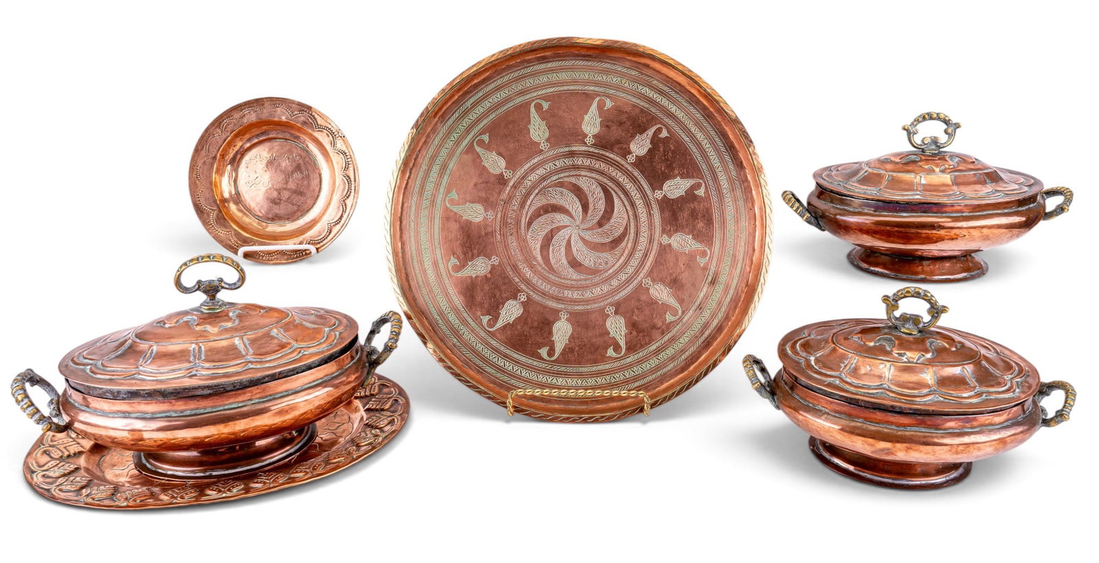 Antique Persian Copper Tureens, Tray, Dishes: Three antique Persian copper tureens and lids, including one with an undertray. Very good condition with etched designs. Measures approx. 15"Lx9"Wx9"H. Also, large flat copper antique dish with etched