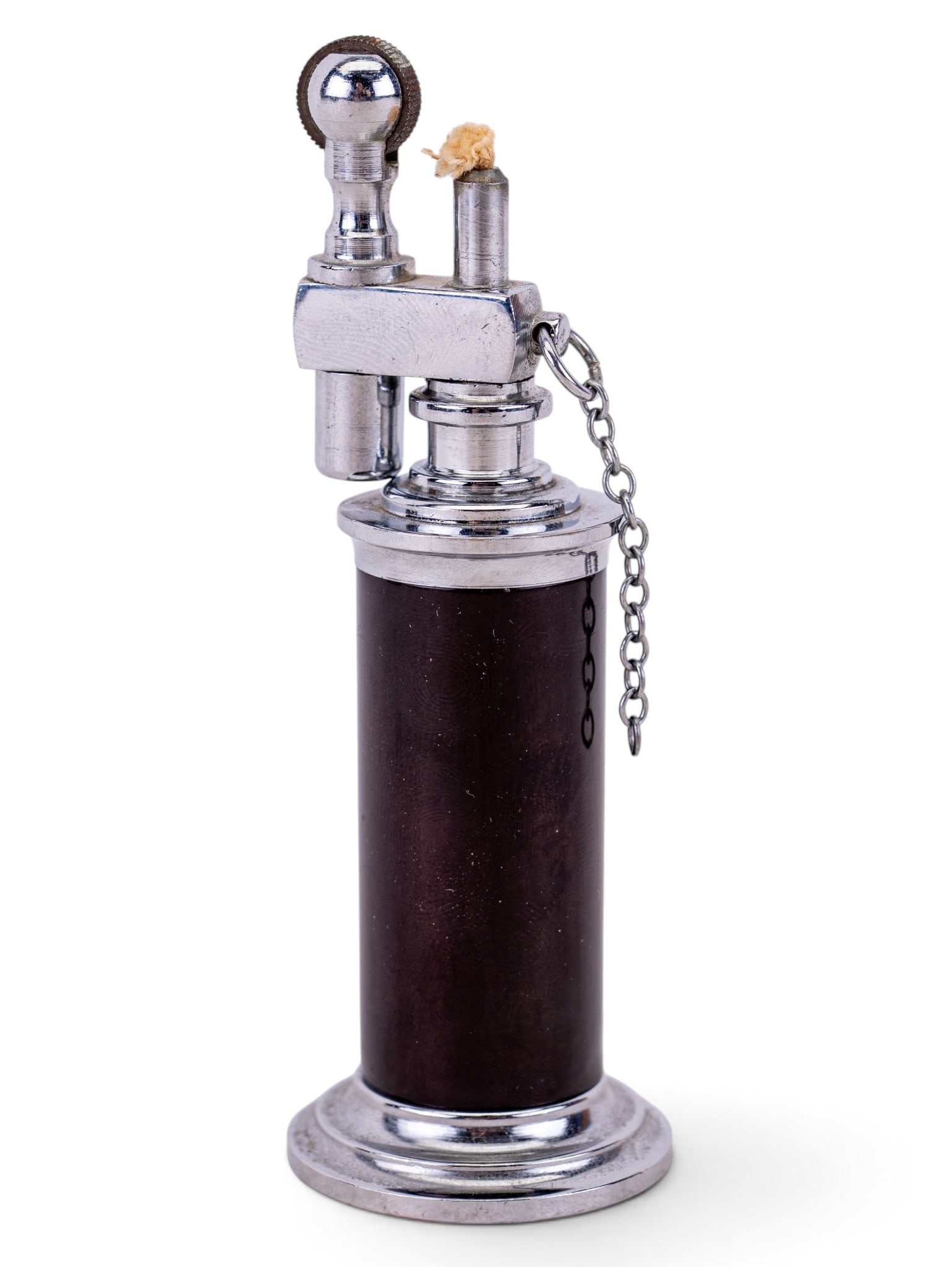 Vintage Midcentury Daltis Chained Column Lighter: Daltis column table lighter dates back to the mid-1940s to mid-1950s. Features a petrol-powered mechanism with a chain-attached cap (one hook that is supposed to attach chain to top of cap is missing,