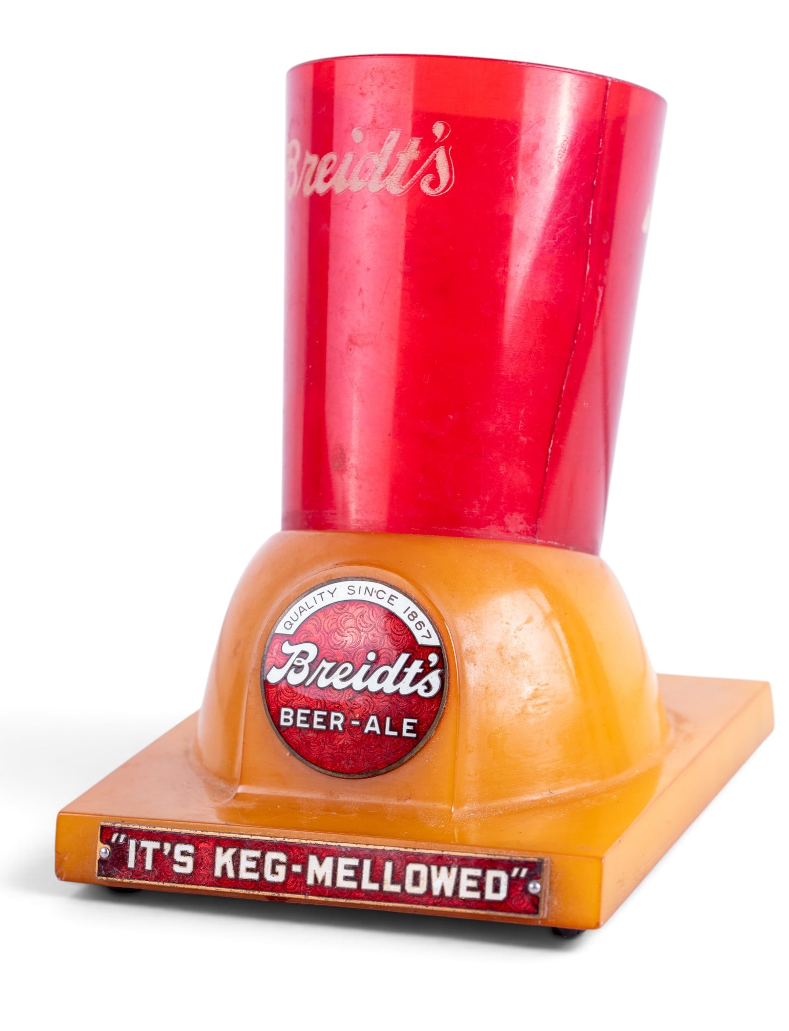 Breidt's Beer Foam Scraper Holder: Breidt's Beer vintage 1930's bakelite foam scraper holder with "It's Keg-Mellowed" plaque. Measures approx. 6.5" H x 5" W x 5.25" D.