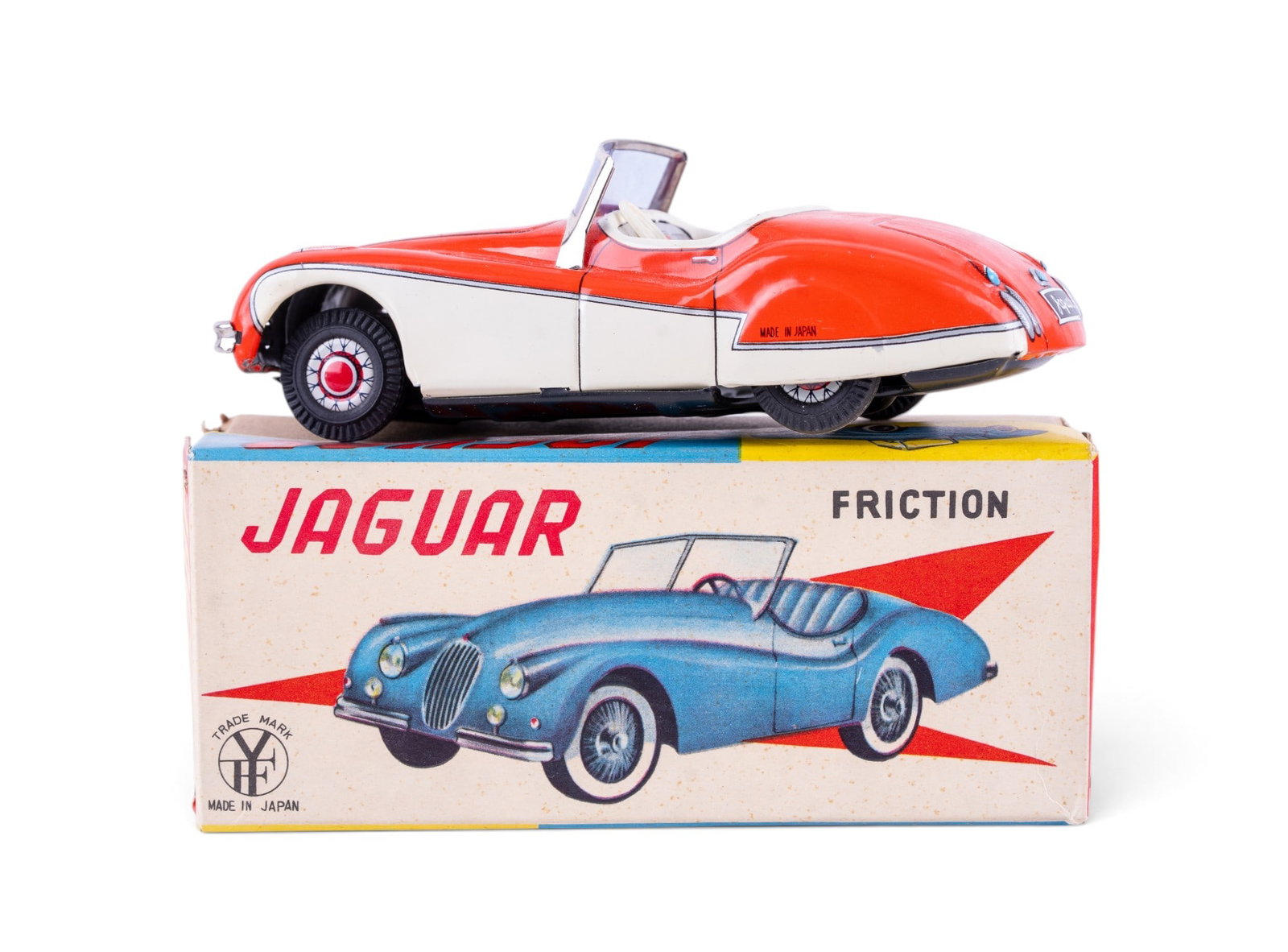 Yachio Tin Friction Jaguar w/ Box: Yachio tin friction Jaguar toy car with original box. Ca 1960.