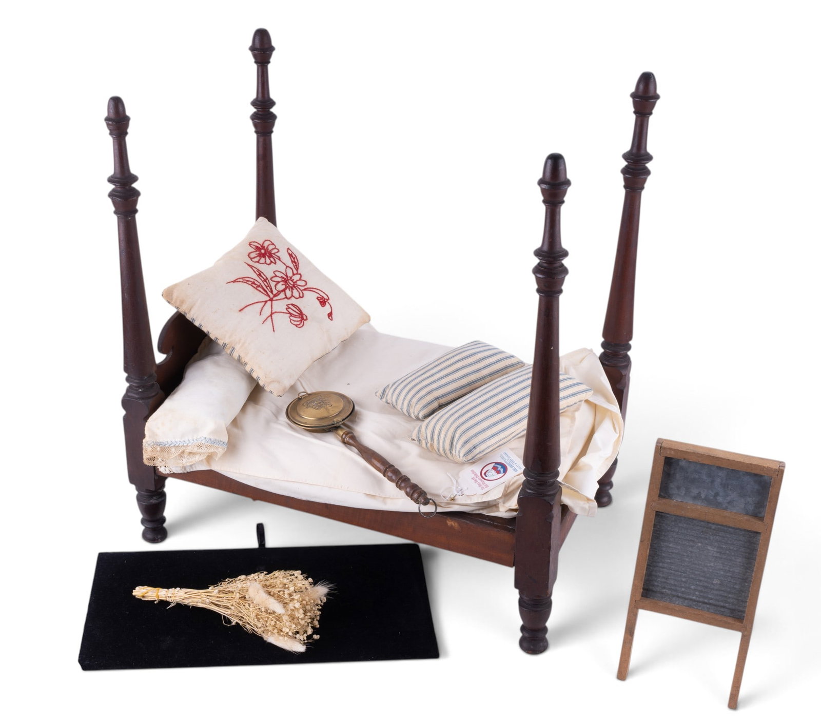 Four Poster Bed - Salesman Sample: A vintage dark stained wood 1/3 scale dollhouse miniature or salesman sample four poster bed with turned spindle posts, and a washboard. Bed measures approx. 18" D x 12.5" W x 20" H.