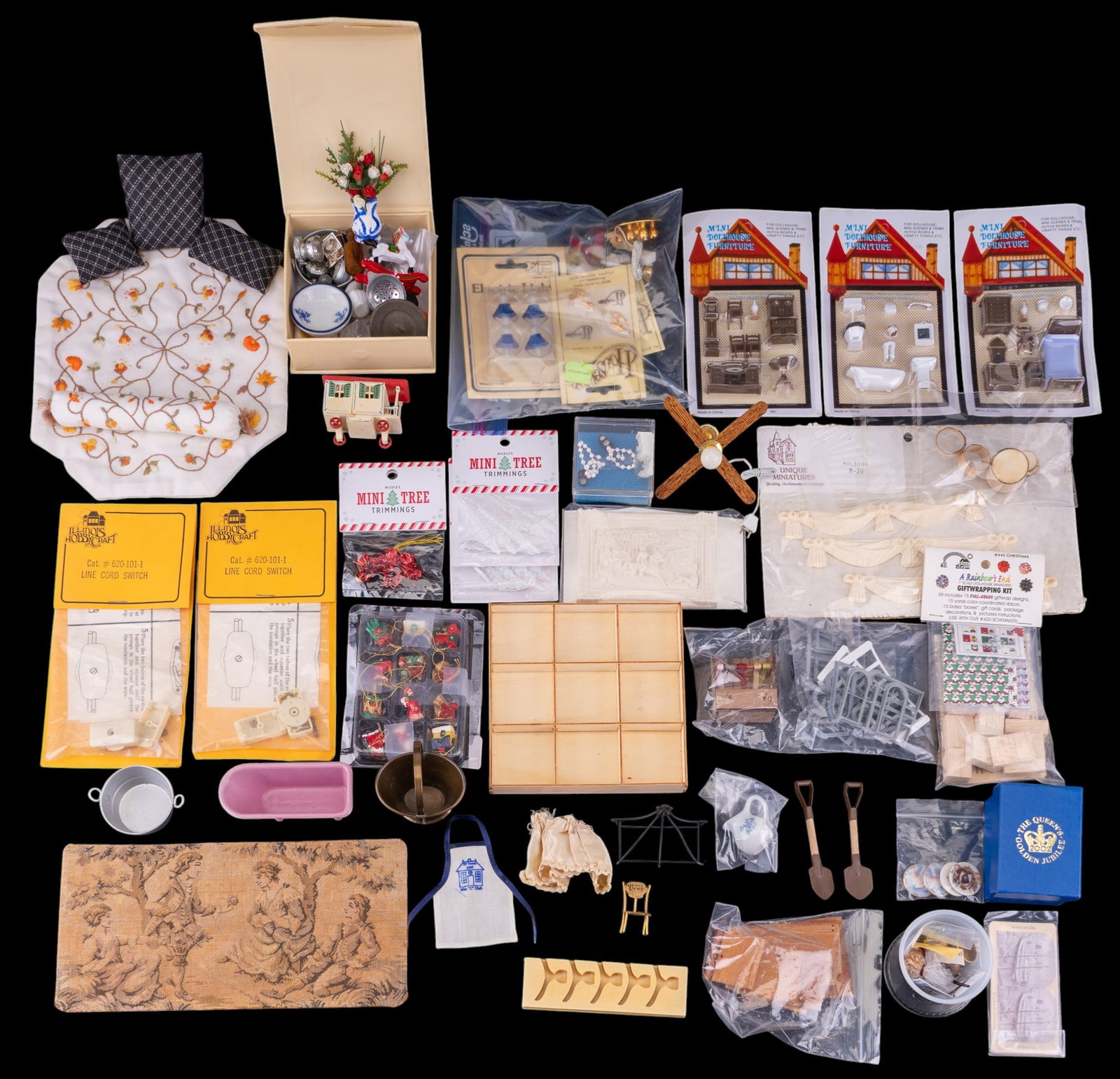 Miniature Dollhouse Accessories: A large assortment of miniature dollhouse accessories, some in original packaging, including glass bottles, lamps, kitchen items, vases, plates, plaster applique, switches, Christmas decor, and more.