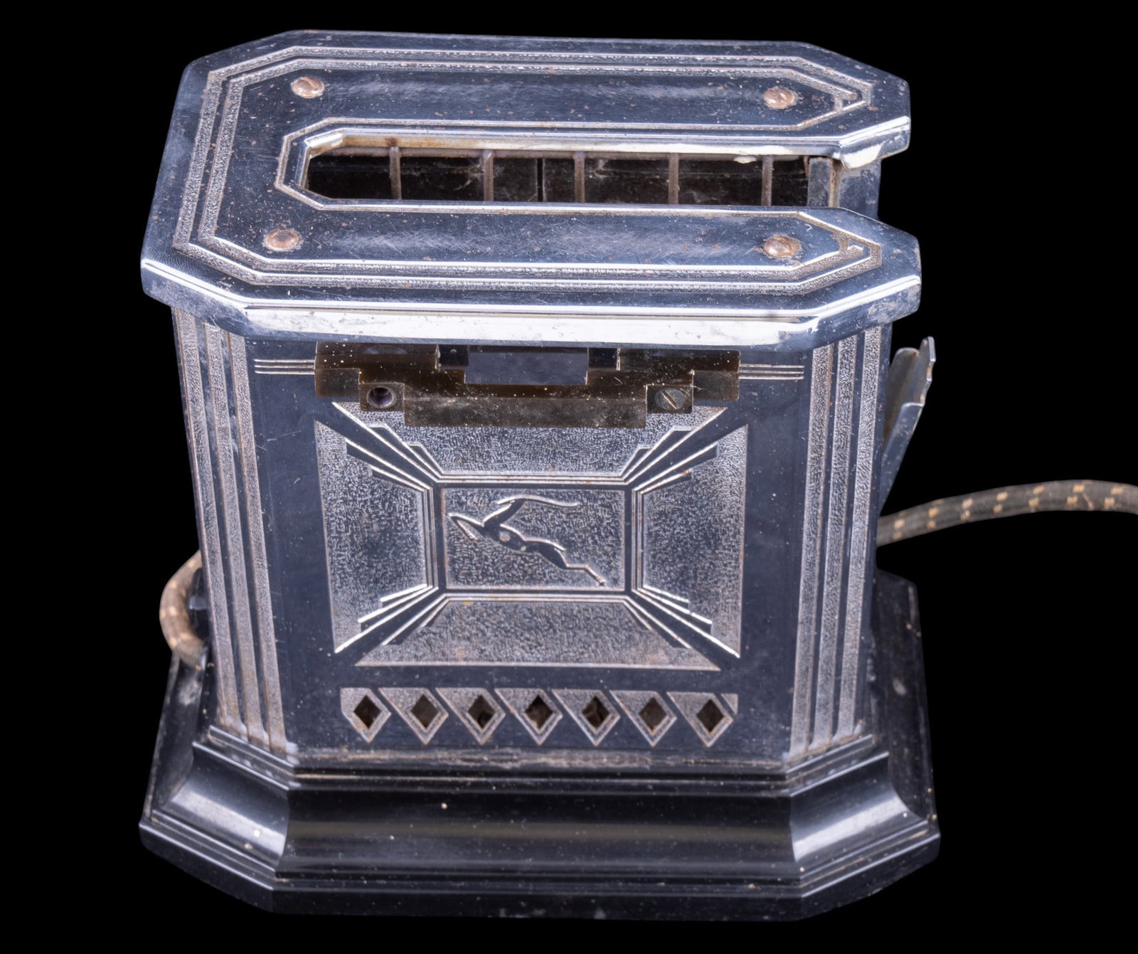 Art Deco GE Hotpoint Chrome Toaster: Vintage 1930's art deco General Electric hotpoint chrome toaster by Raymond Patten featuring gazelle motifs. Needs rewiring. One handle missing screw. Measures approx. 7.5" W x 7" H x 5" D.