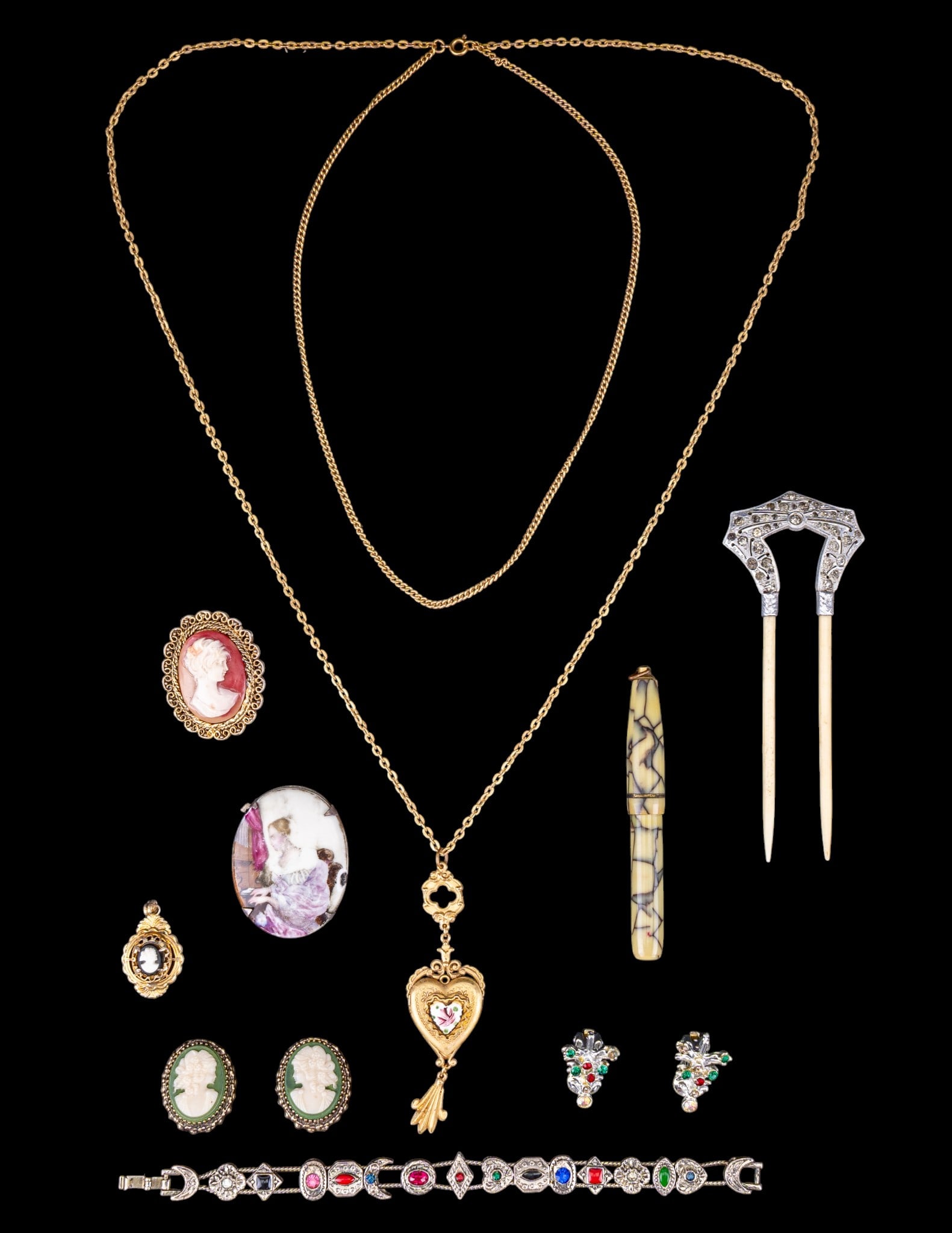 Vintage Jewelry including Cameos: Set of Whiting and Davis vintage cameo style earrings, pins, heart locket, vintage celluloid pen and more.