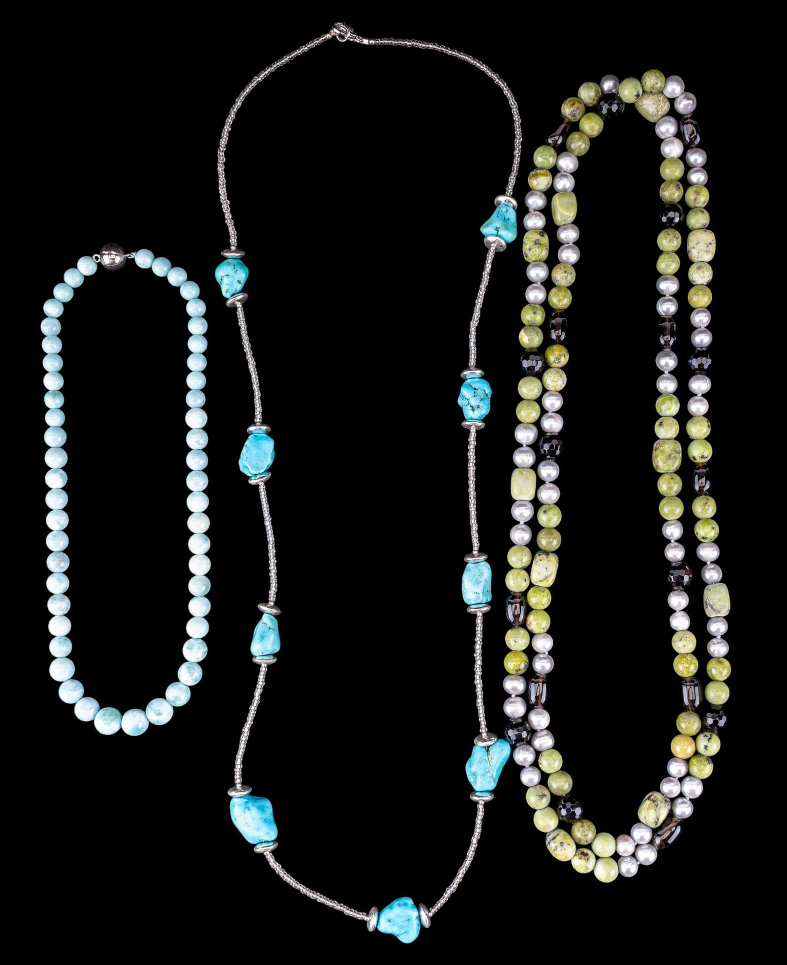 Turquoise, Pearl and Stone Necklaces: Long pearl and smoky quartz with green turquoise, Lee Sands turquoise and bead necklace, as well as a larimar stone necklace with sterling magnet clasp.