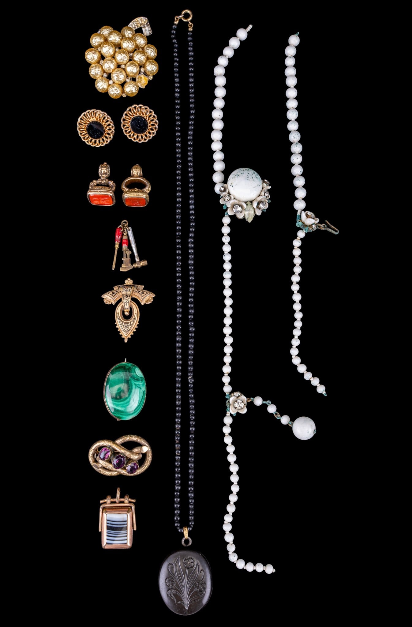 Victorian, Vintage Estate Jewelry: Three Victorian seal charms and an agate pendant, antique locket, antique malachite pin, Victorian and amethyst brooch and more. Damaged white bead Miriam Haskell necklace for repairs.