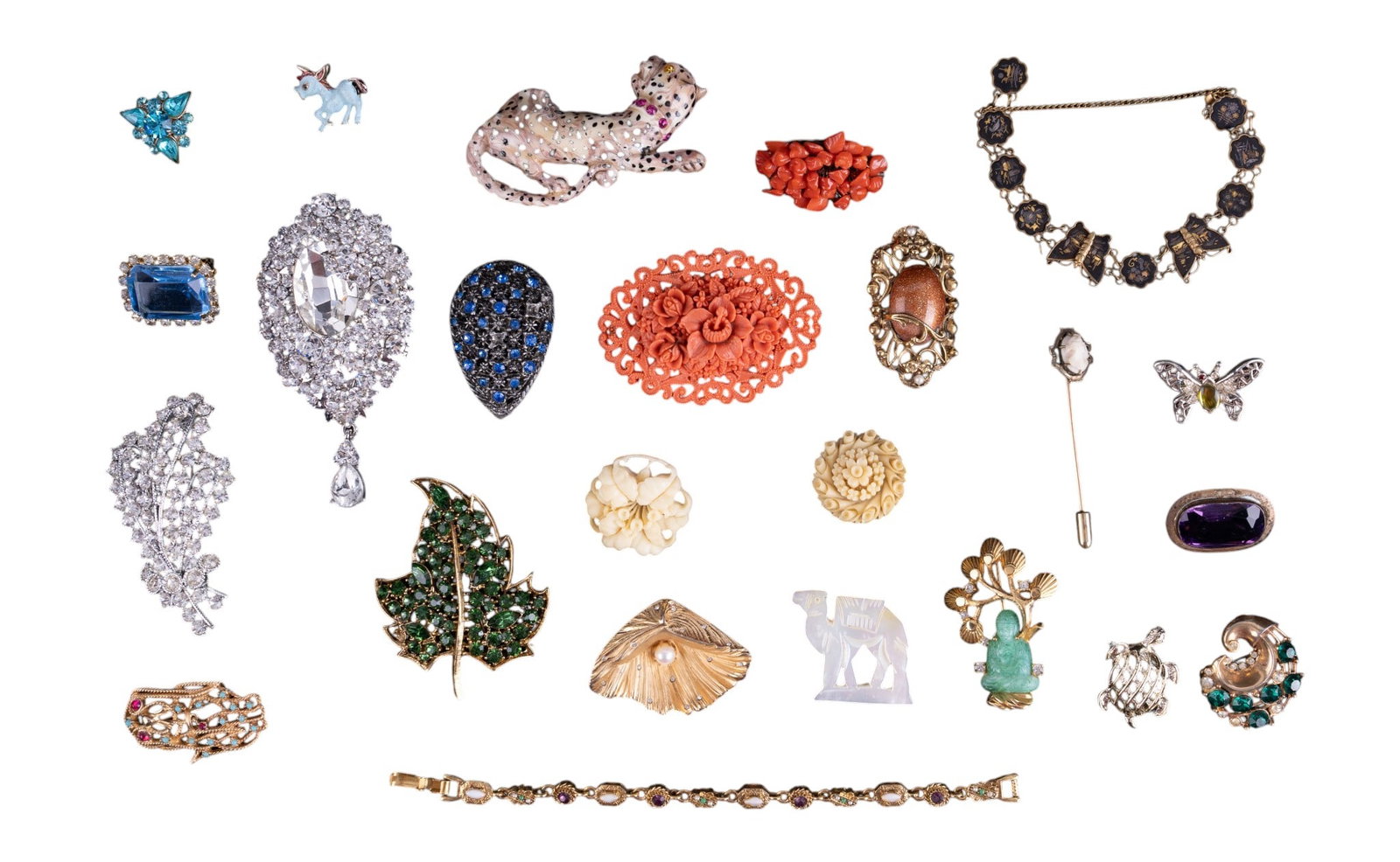 Vintage Estate Brooches / Pin: Signed Ciner blue / red stone dog brooch, Budha style brooch, vintage coral brooch, rhinestone green leaf brooch, leopard brooch, cameo stick pin, bracelets, and more.