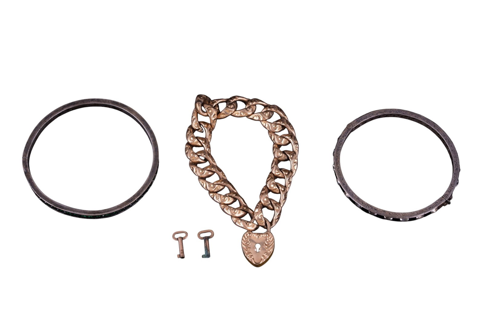 Antique Estate Bracelets: Pair of sterling silver art deco bangle bracelets and a large Victorian heart & lock bracelet.