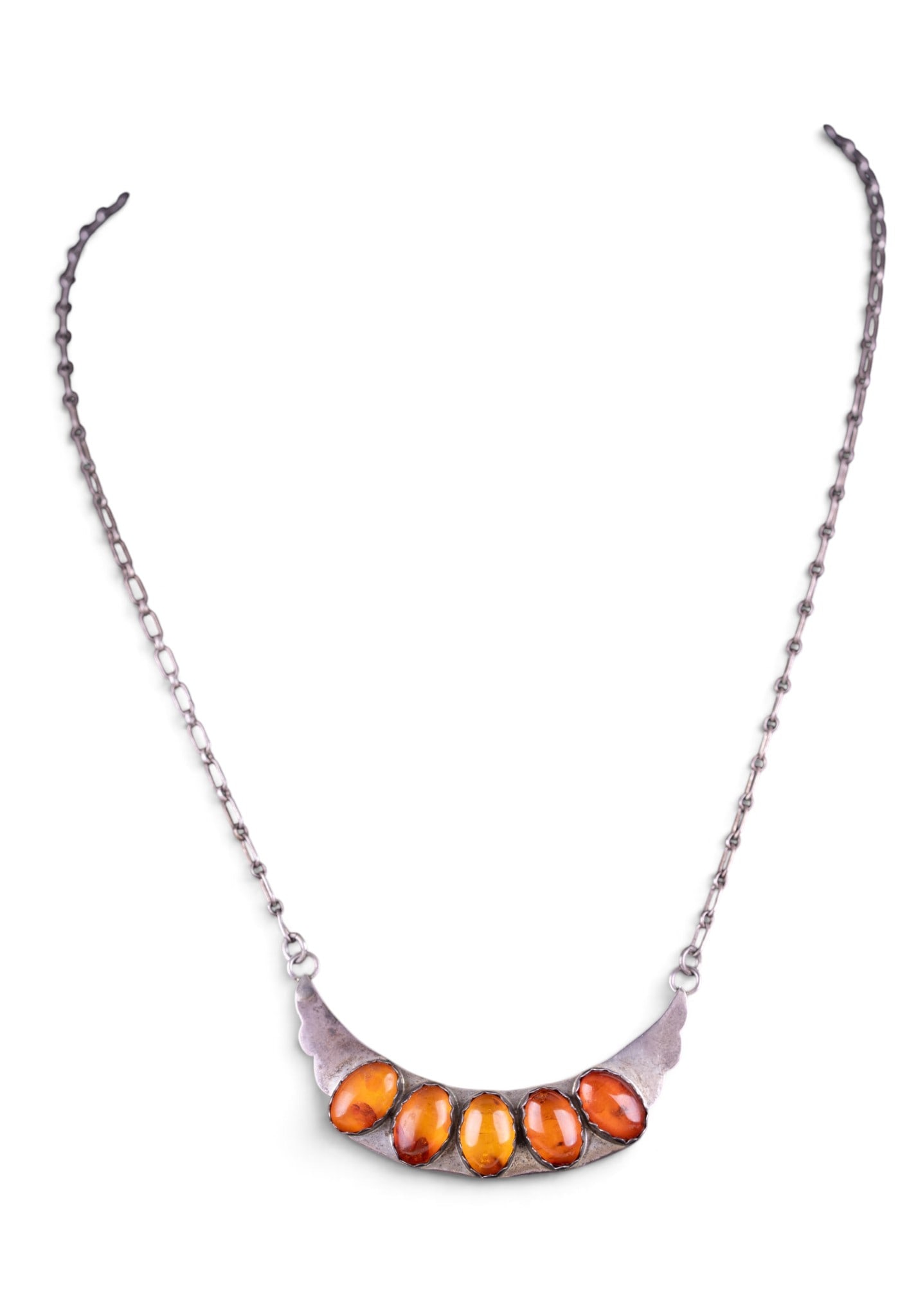 Amber and Sterling Necklace: Sterling silver link necklace with a panel featuring 5 pieces of amber signed S.S. / Sterling.