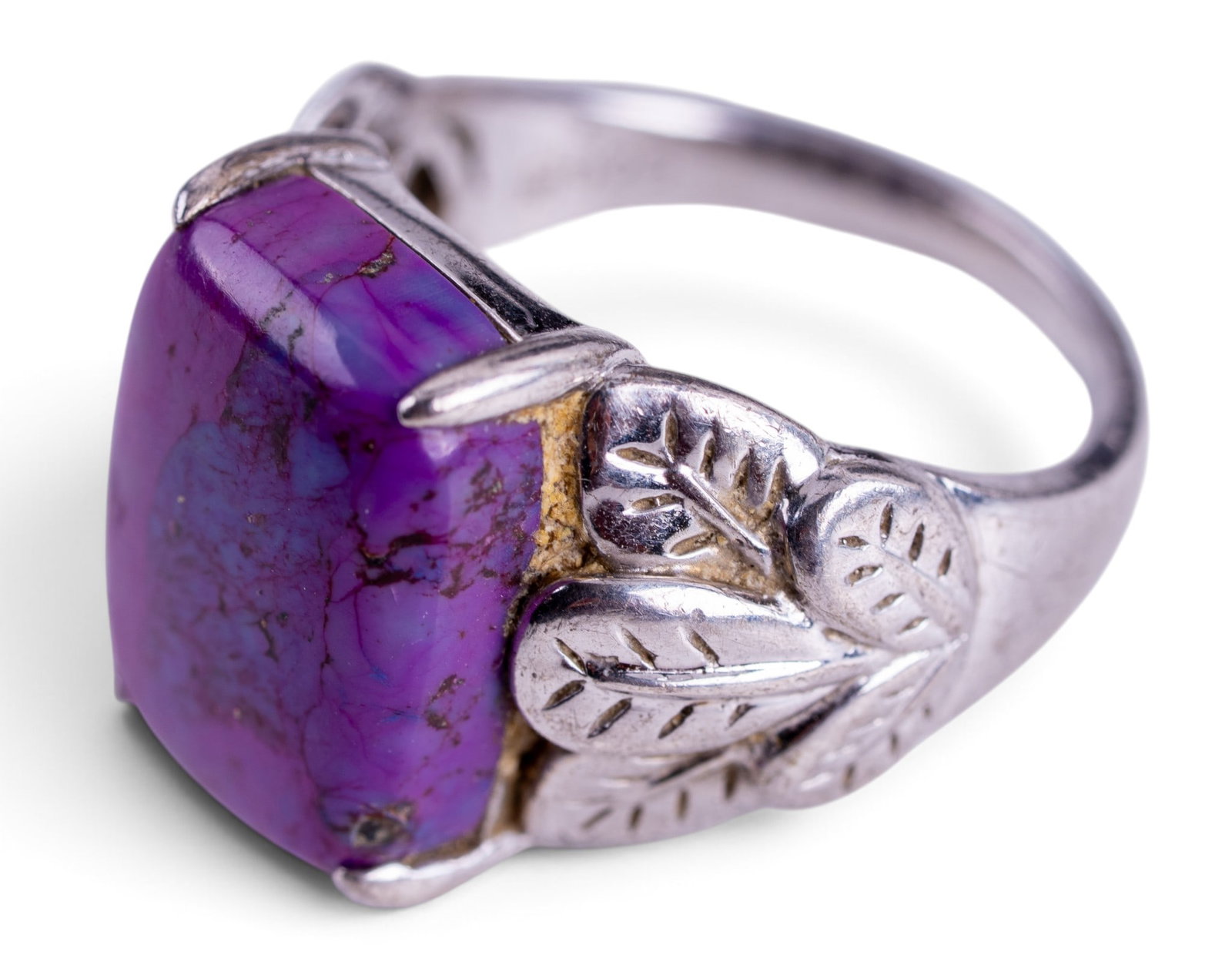 Sterling Silver Ring: Sterling silver ring set with large square purple turquoise style gemstone.
