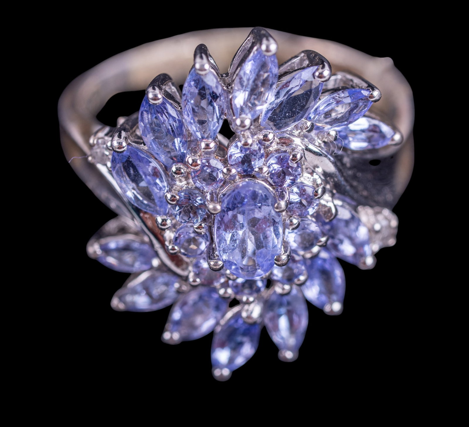 Tanzanite and Sterling Silver Ring: Sterling silver ring set with tanzanite clusters.