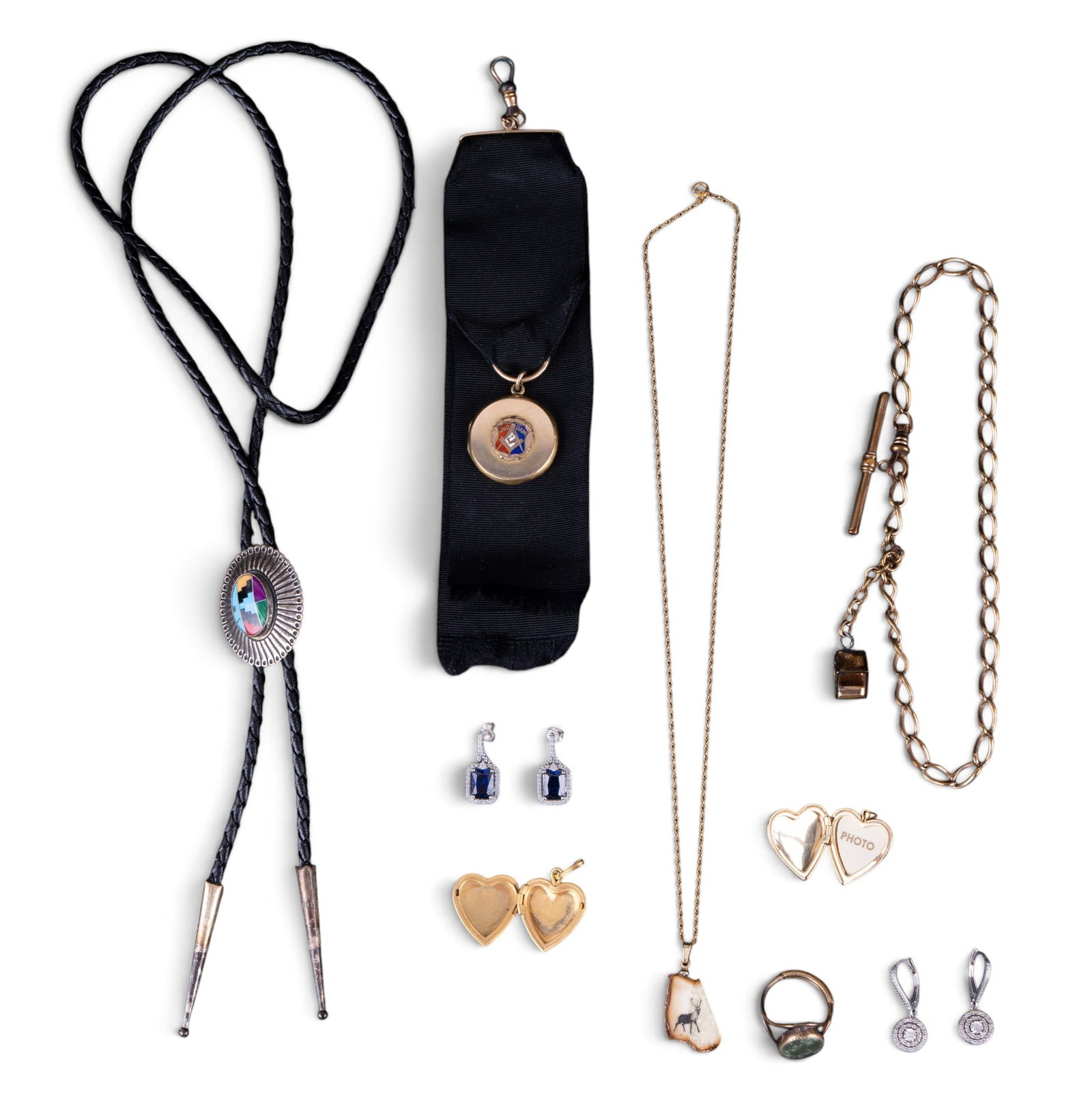 Sterling Silver and Gold Filled Jewelry: A collection of steling siolver and gold filled jewelry including a sterling concho bolo tie with silver tips and natural stone inlay, two pairs of sterling silver and facet cut stone pierced earrings