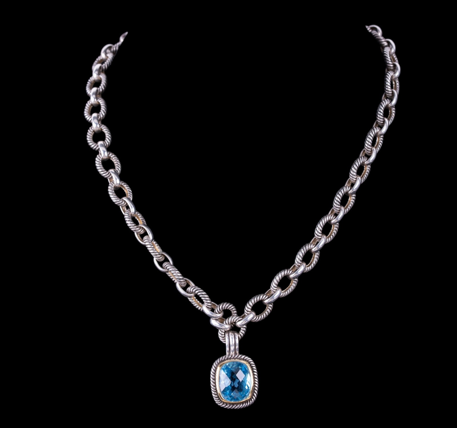 Sterling Silver and Blue Topaz Necklace: Thick cable link necklace (sterling silver) with detachable blue topaz pendant.