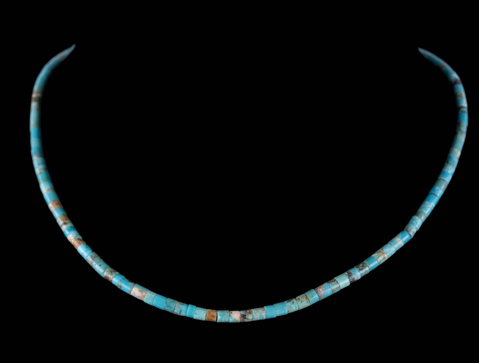 Heishi Turquoise Bead Necklace: A 14" L end to end necklace featuring turquoise heishi beads and a hook clasp.