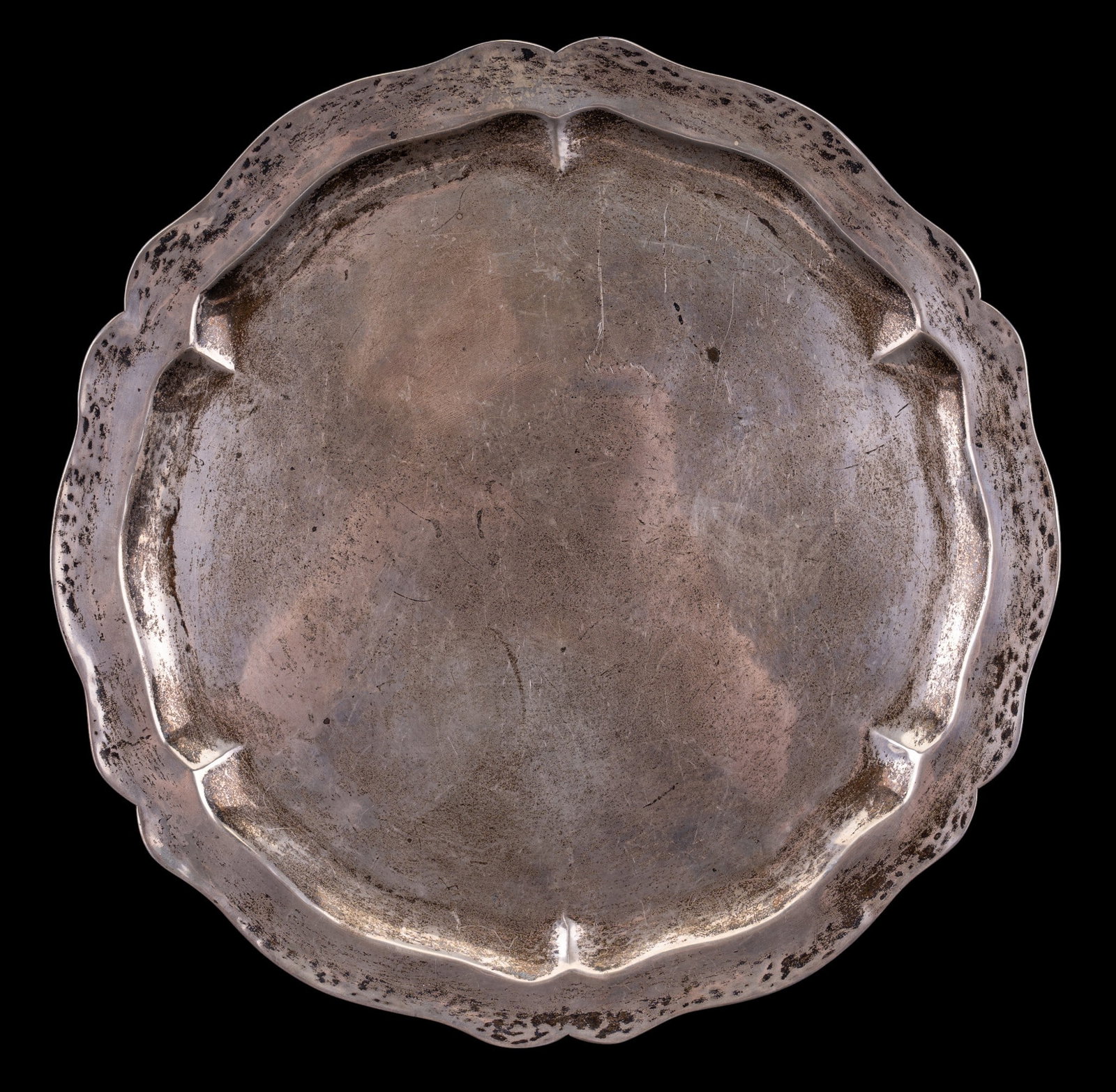 Peruvian Sterling Serving Tray: Peruvian sterling silver serving tray with scalloped rim, 13.5" dia. Marked Peru and 925. Weighs approx. 635 grams/ 22.4 ounces.