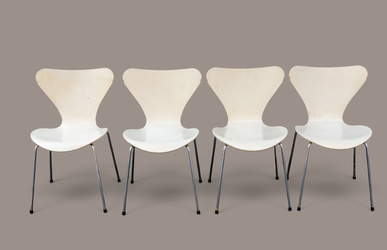 Set of 4 Fritz Hansen Side Chairs: Set of 4 Fritz Hansen Series 7 side chairs, each with chrome frame and wooden seat. Each measures approx. 30" H x 18" SH x 19" W x 18" D. Danish Modern 2002.