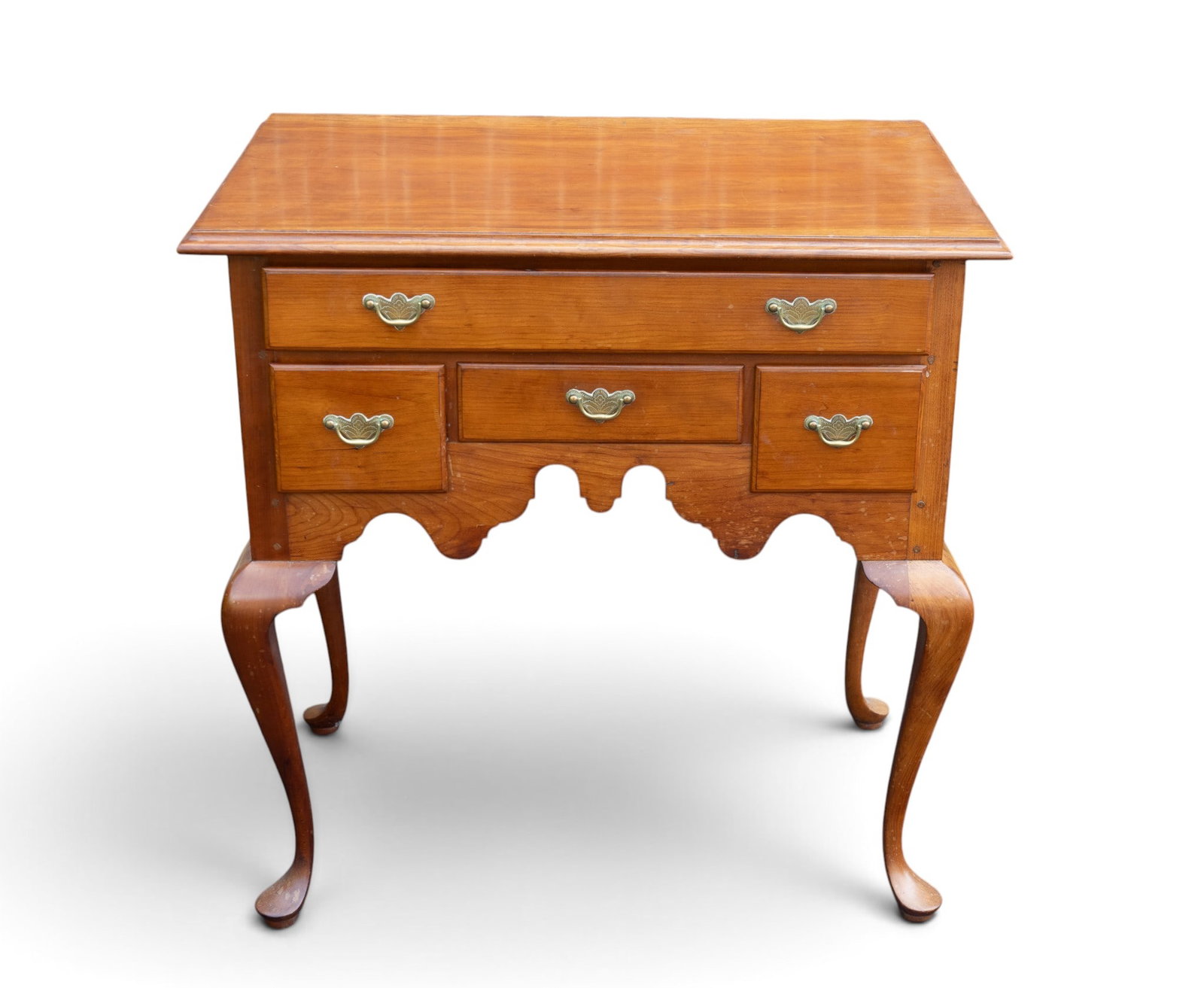 Queen Anne-style Lowboy: Queen Anne-style lowboy with single board top. scalloped apron, cabriole legs, and brass hardware. Measures approx. 31" H x 30" W x 19" D. Came from fine estate located in Chestnut Hill, Philadelphia.