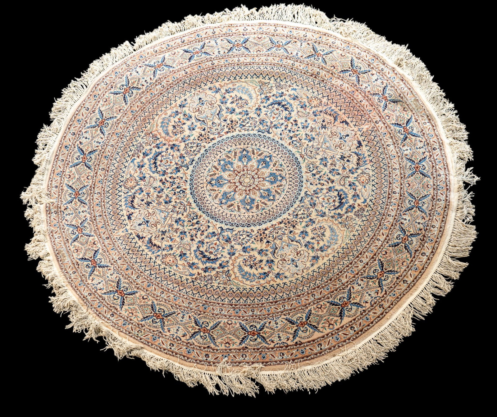Fine Persian Round Area Rug: Fine quality round Persian area rug with prominent central medallion with surrounding repeating floral motif. Some staining present to outer ring/border. Measures approx. 6'2" diameter.