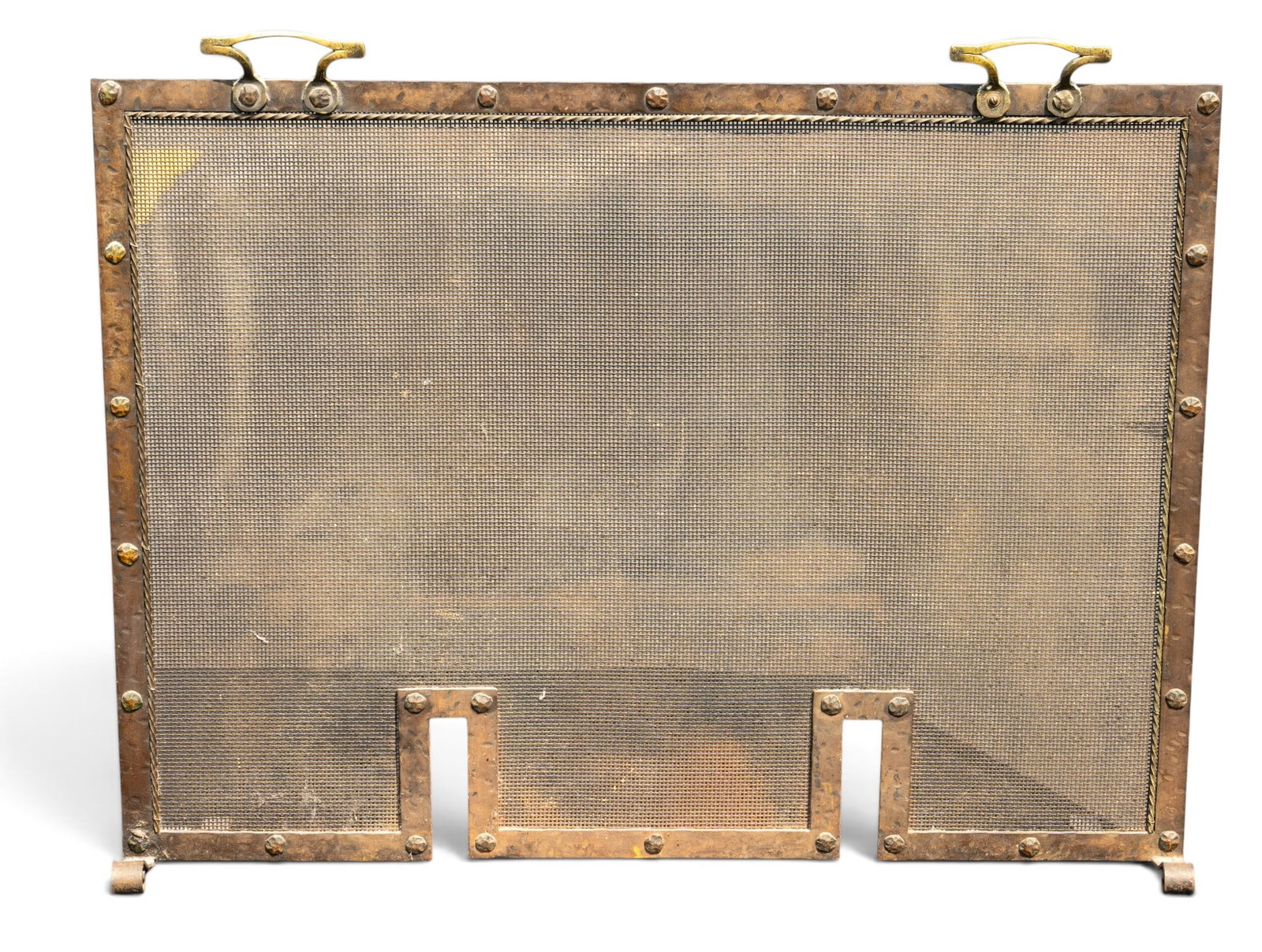 Arts and Crafts Iron Fireplace Screen: Arts and Crafts iron and metal mesh fireplace screen along with 2 brass top handles. Measures approx. 32" Screen height x 34.5" Total height with handles x 43.5" W x 8" D (with feet). Came from fine