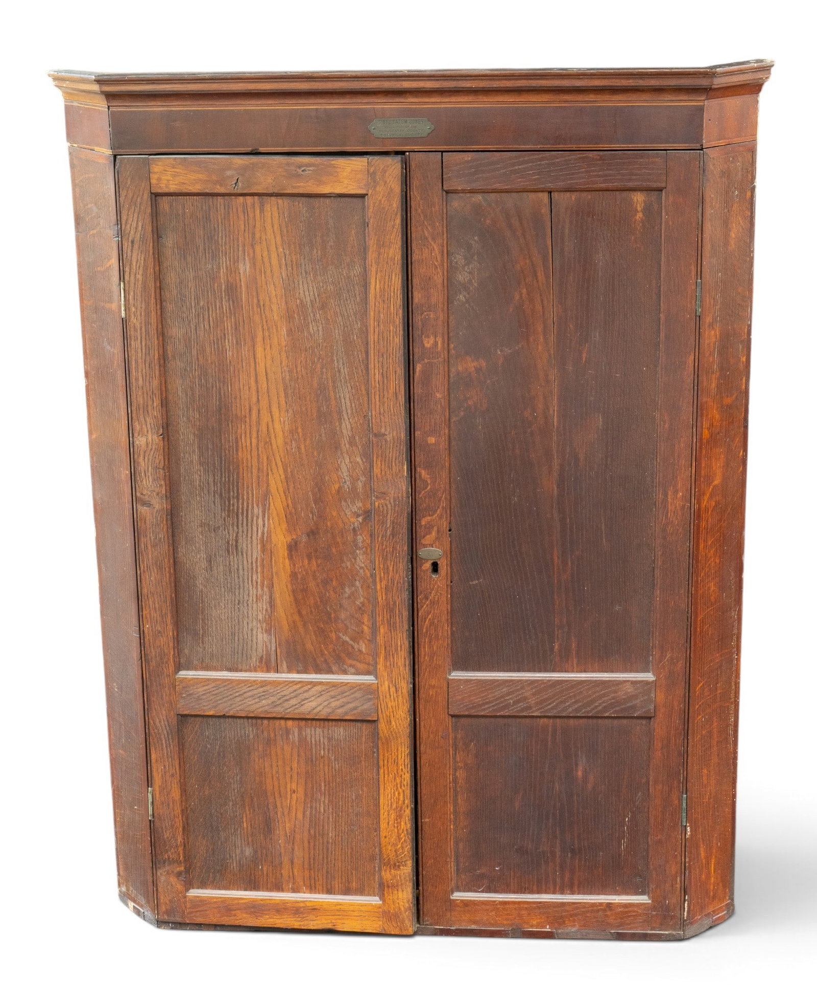 Georgian Oak Hanging Corner Cupboard: Georgian oak hanging corner cupboard with 3 curved shelves to interior terminating in 3 small drawers with dovetailed joinery. Brass plaque affixed to front reads "Cibyl Tatum Jones from the