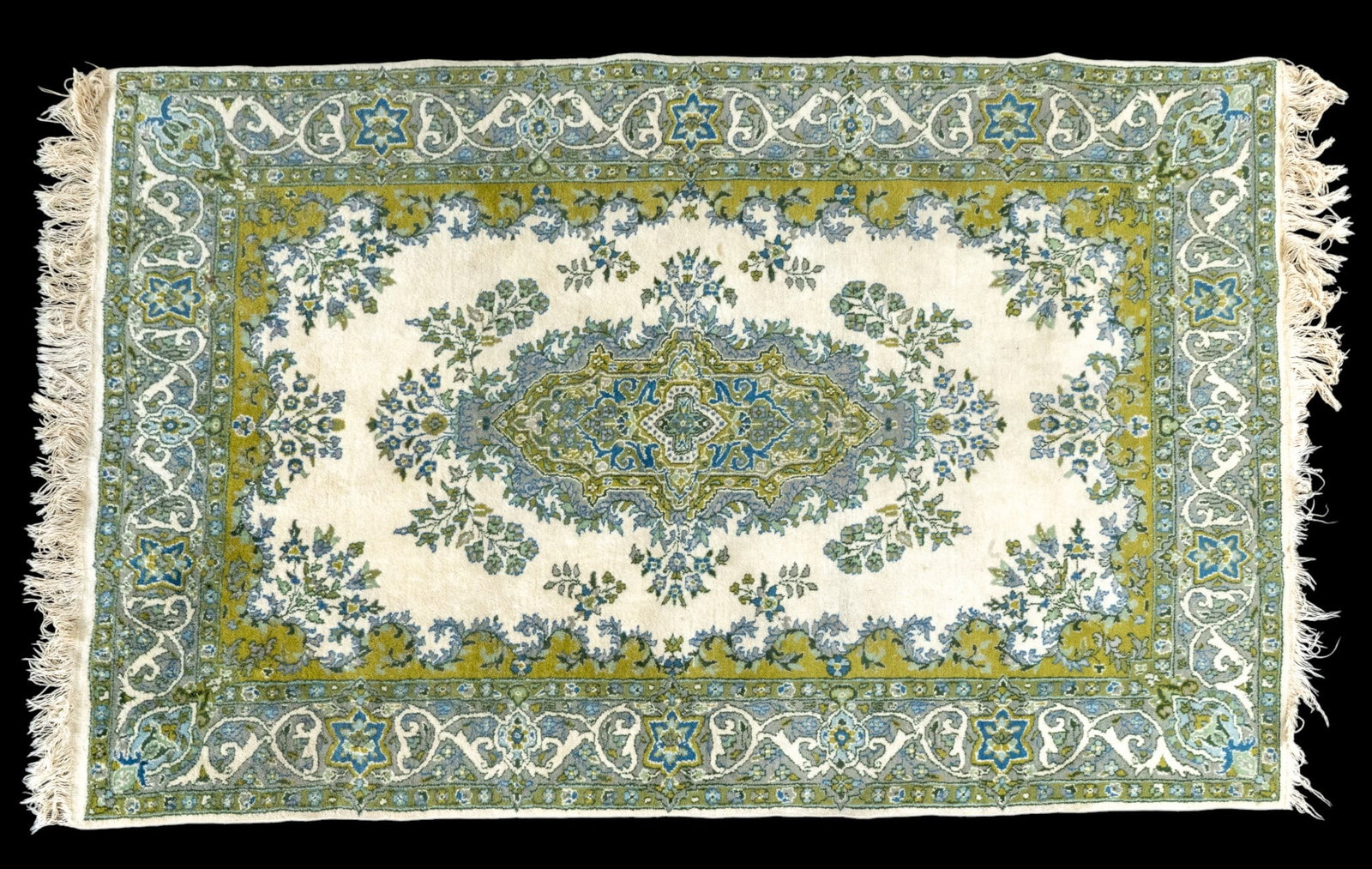 Hand-Woven Persian Area Rug: Hand-woven Persian area rug with green, blue, and cream tones. Measures approx. 4'2" x 6'.