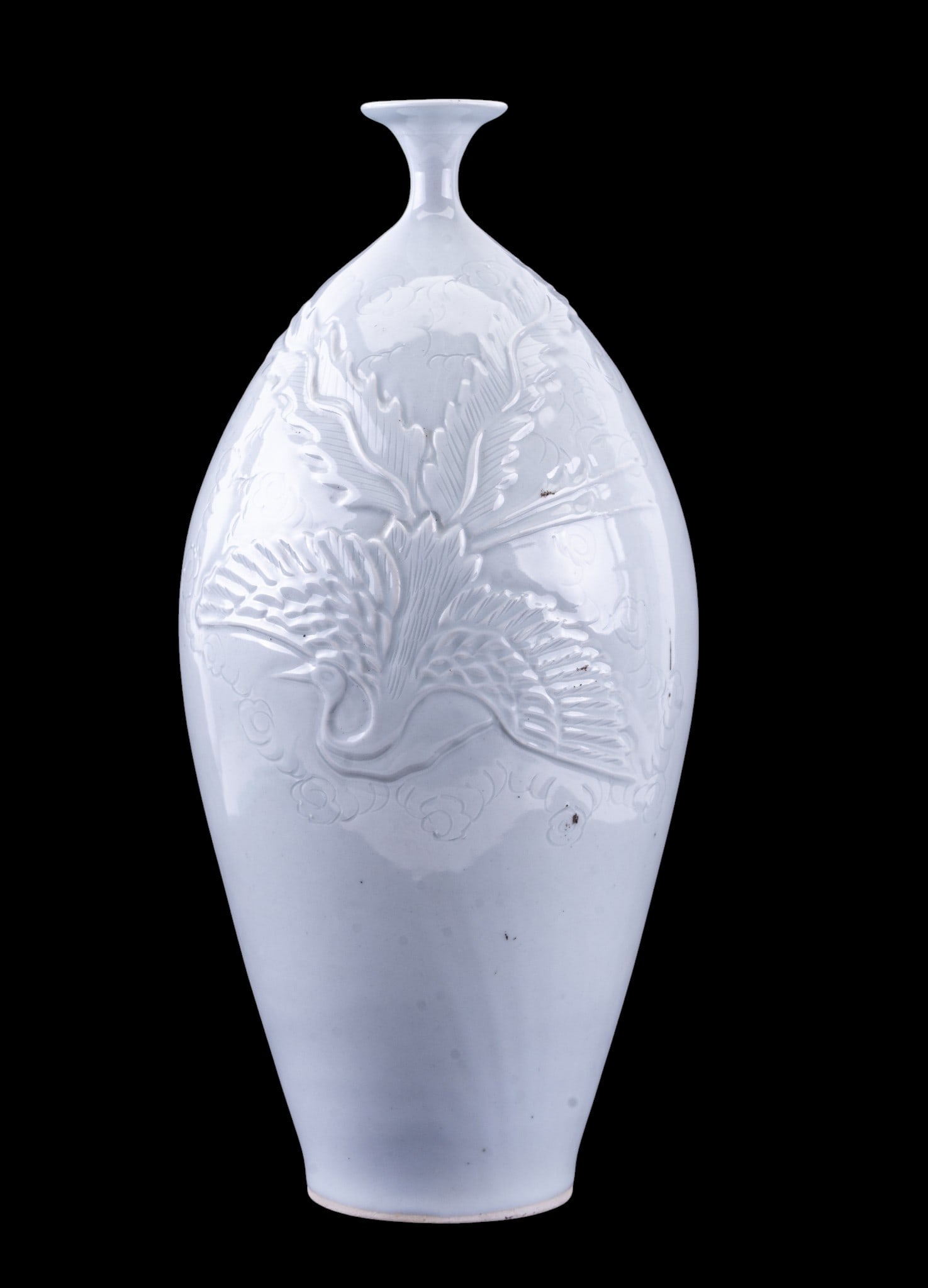Phoenix Celadon Vase: A vintage celadon glazed vase featuring a relief design depicting a flying phoenix, hand signed on the bottom, note edge loss to bottom, measures approx. 15.5" H.