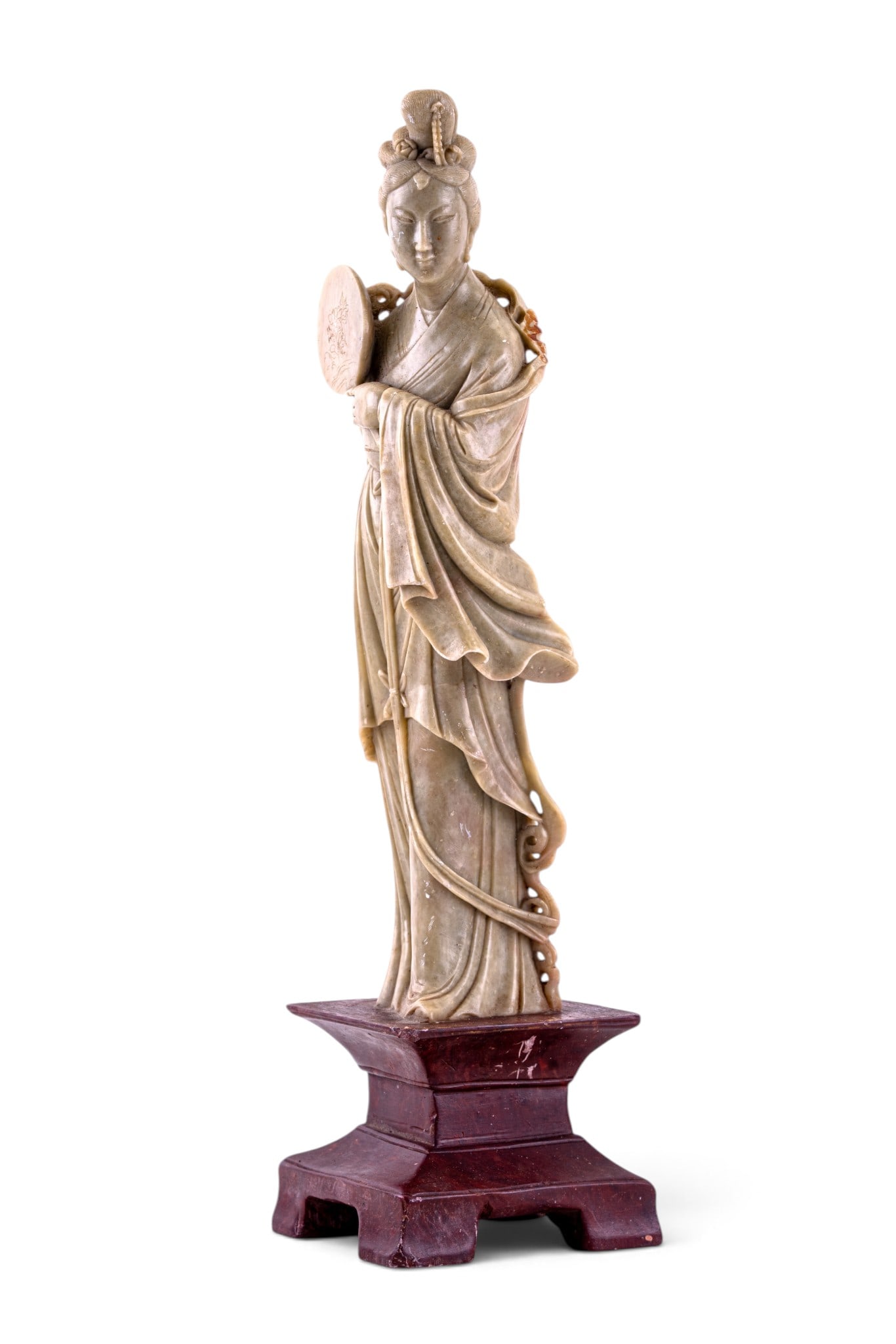 Chinese Carved Soapstone Guanyin Statuette: A hand carved Chinese soapstone statuette depicting the deity Guanyin holding a fan, note loss over left shoulder and front left corner of the base, measures approx. 16" H.