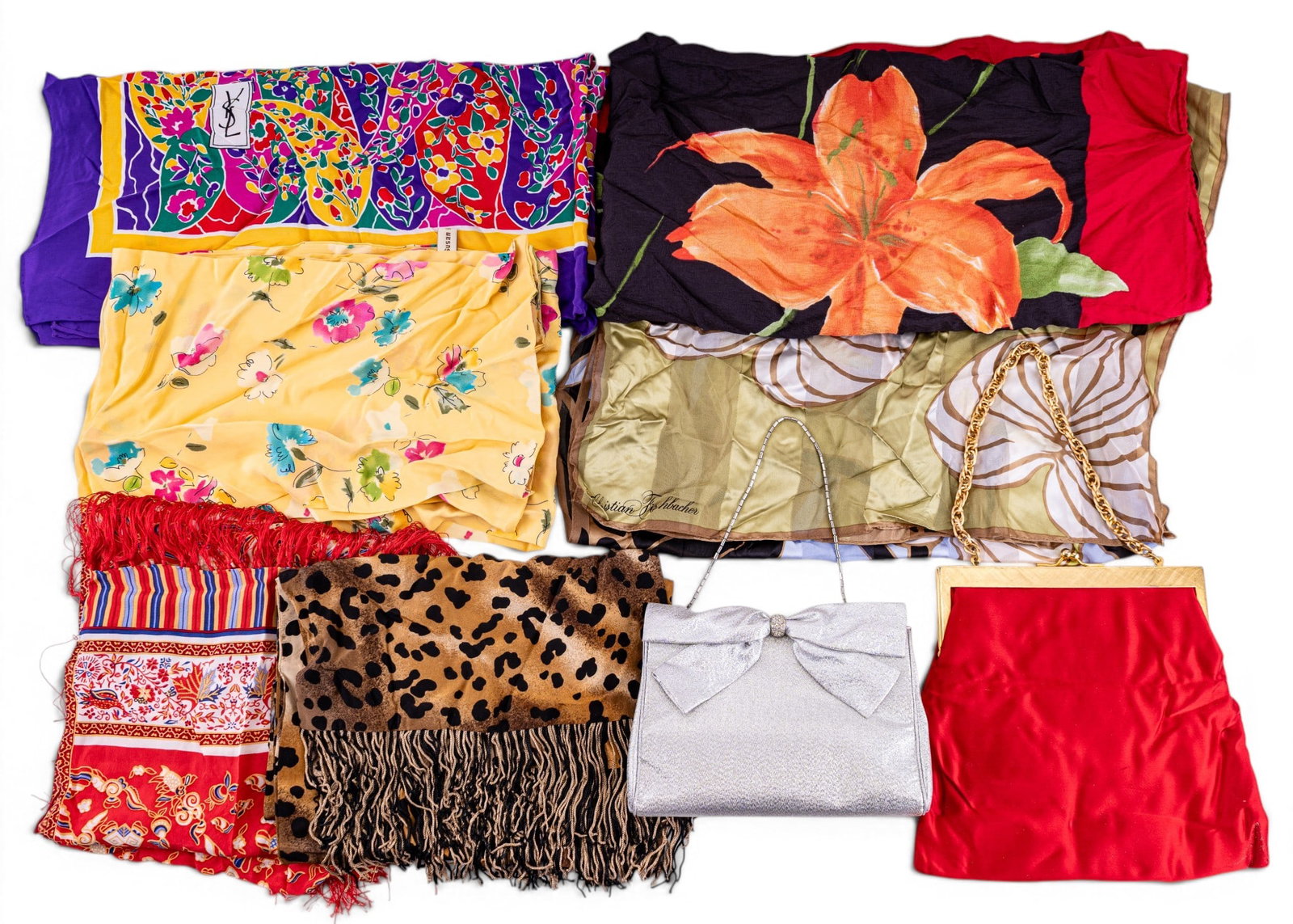 Yves Saint Laurent Silk Scarf, 5 More & 2 Clutches: Collection of six patterned silk scarves, some designer, plus two clutch purses. Designer scarves include one Yves Saint Laurent (French luxury), one Susan Daniels and one Christian Fischbacher scarf 