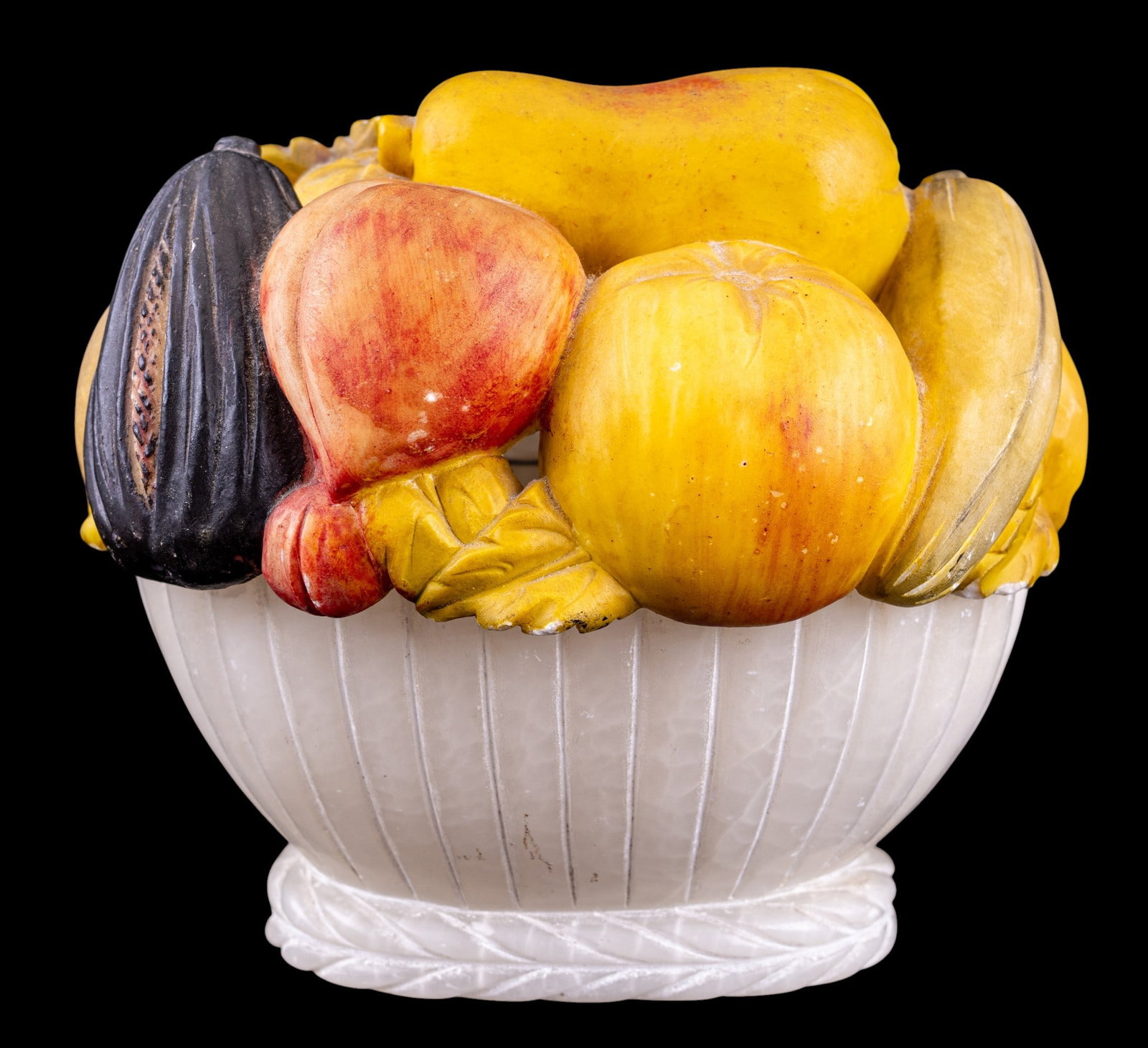 Carved Alabaster Fruit-Form Covered Dish: Two-piece carved alabaster covered bowl comprising an oval form fluted dish/bowl and a removable lid modeled as assorted fruit and foliage. Measures approx. 6.25" H x 7" W x 5" D. Came from fine