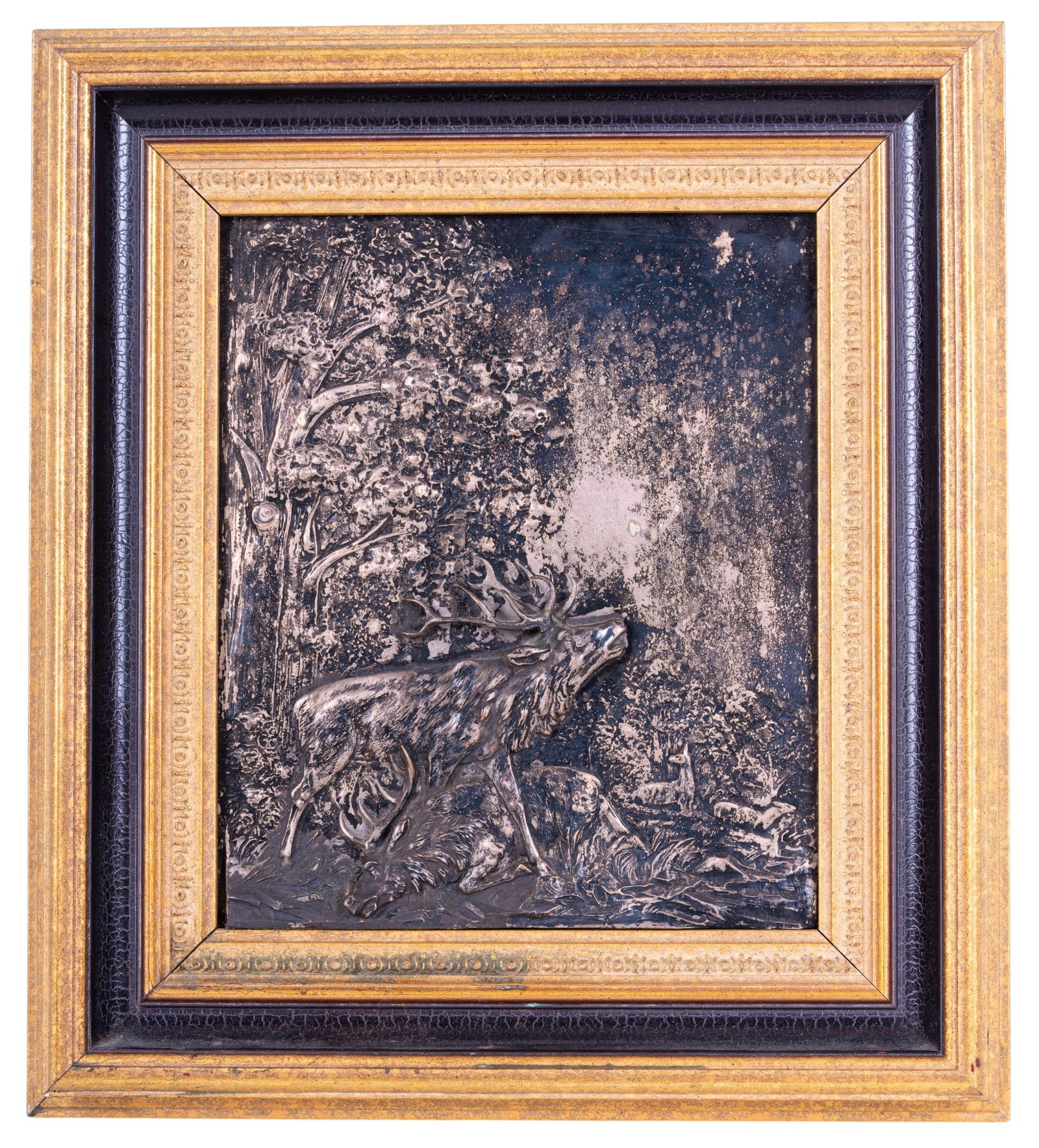 Early Relief Metal Stag Art: An early framed metal sheet relief wall art depicting two stags after fighting, not signed, measures approx. 15" H x 13" W.