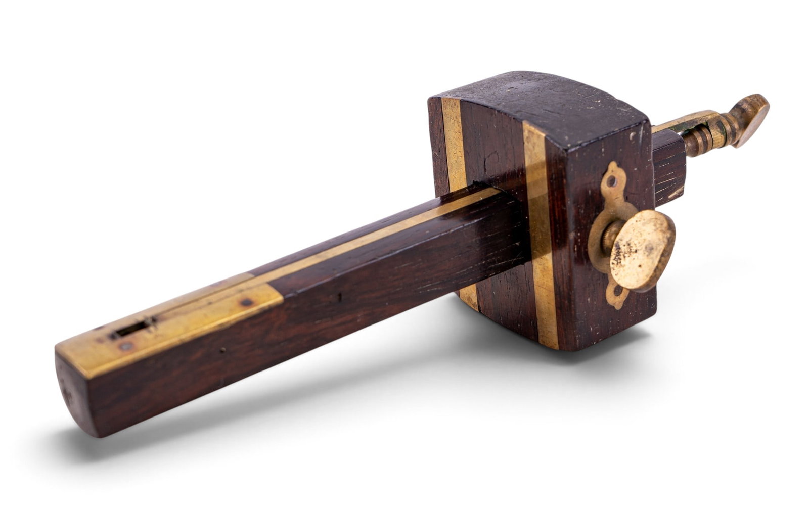 19th Century Brass & Dark Wood Carpenter's Scribe: Crafted carpenter's scribe constructed with a dark wooden beam and brass fittings. Also called marking gauge or mortise gauge. Features a sliding stock and thumbscrew for adjusting the fence. Tools